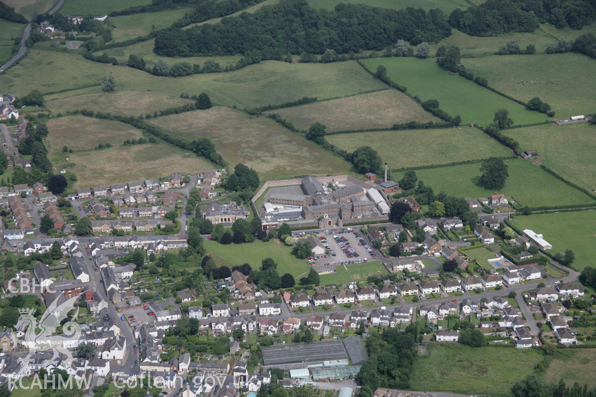 RCAHMW digital colour oblique photograph of H.M. Prison Usk viewed from the west. Taken on 07/07/2005 by T.G. Driver.