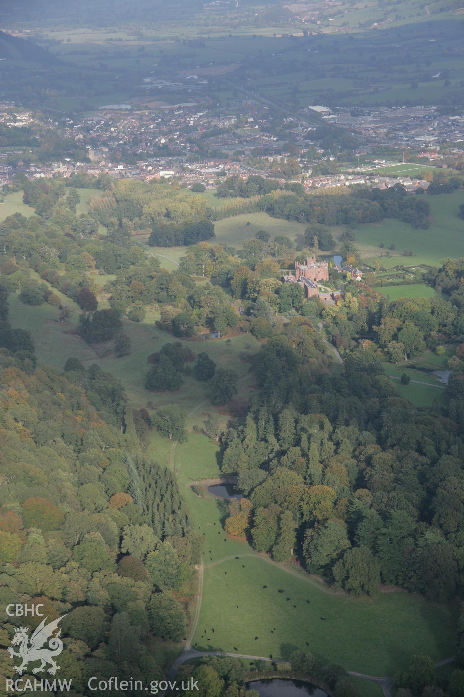 RCAHMW colour oblique aerial photograph of Lady's Mount motte in Powis Castle Park, view looking north-east Taken on 17 October 2005 by Toby Driver