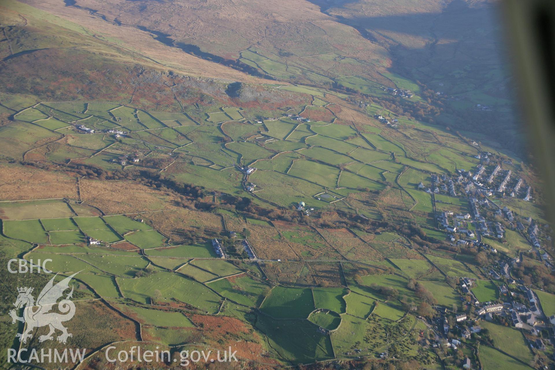 RCAHMW colour oblique aerial photograph of Pen-y-Gaer Hillfort, Cilfodan, Bethesda, showing panoramic landscape view to the south-east of the fort. Taken on 21 November 2005 by Toby Driver