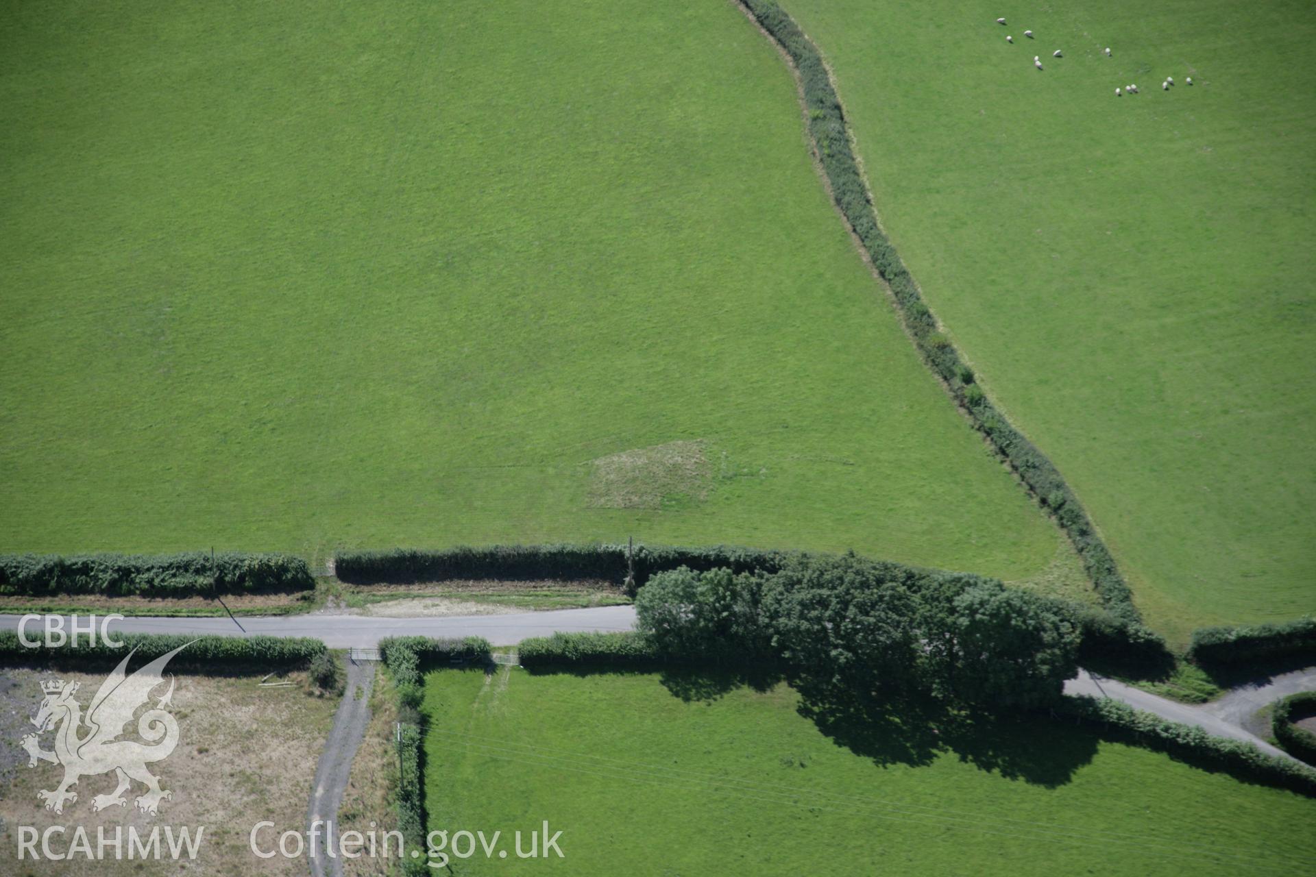 RCAHMW colour oblique aerial photograph of Tower Hill Barrow from the north-east. Taken on 02 September 2005 by Toby Driver