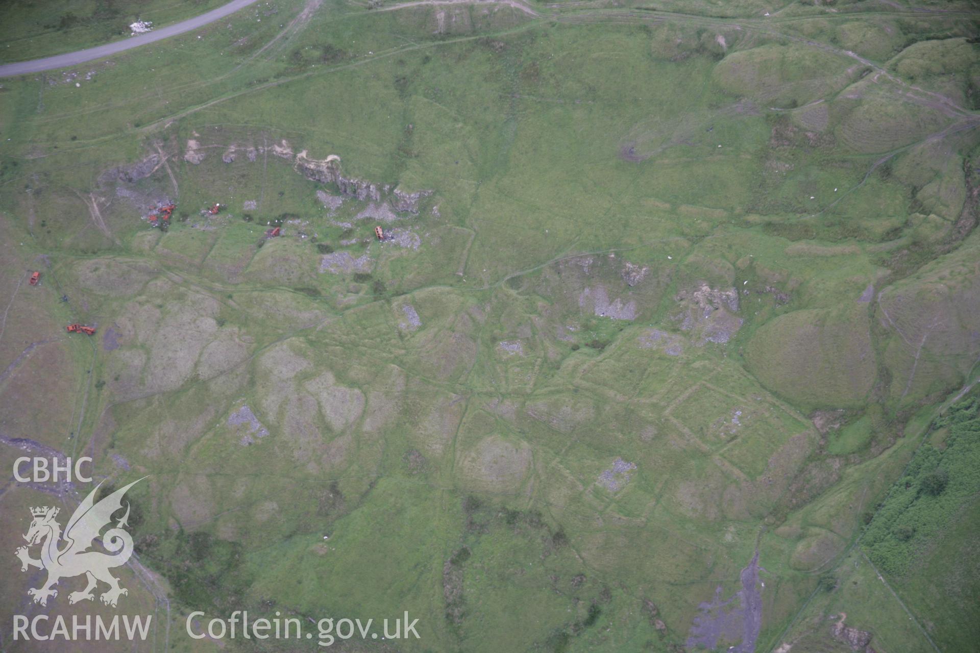 RCAHMW digital colour oblique photograph of a deserted iron mining village at Ffos-y-Fran. Taken on 07/07/2005 by T.G. Driver.