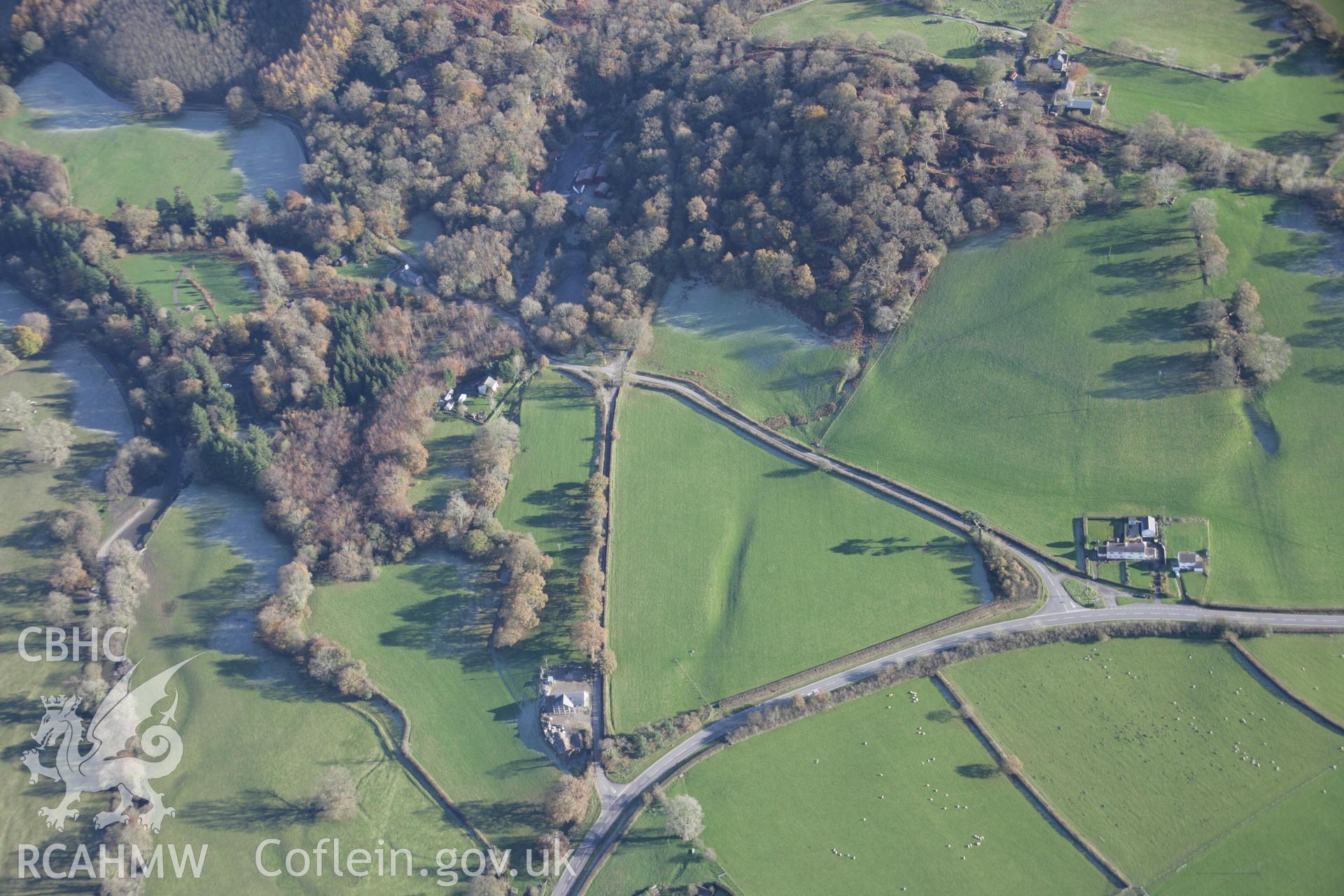 RCAHMW colour oblique photograph of Dolaucothi, earthworks of drainage channel, view from west. Taken by Toby Driver on 17/11/2005.