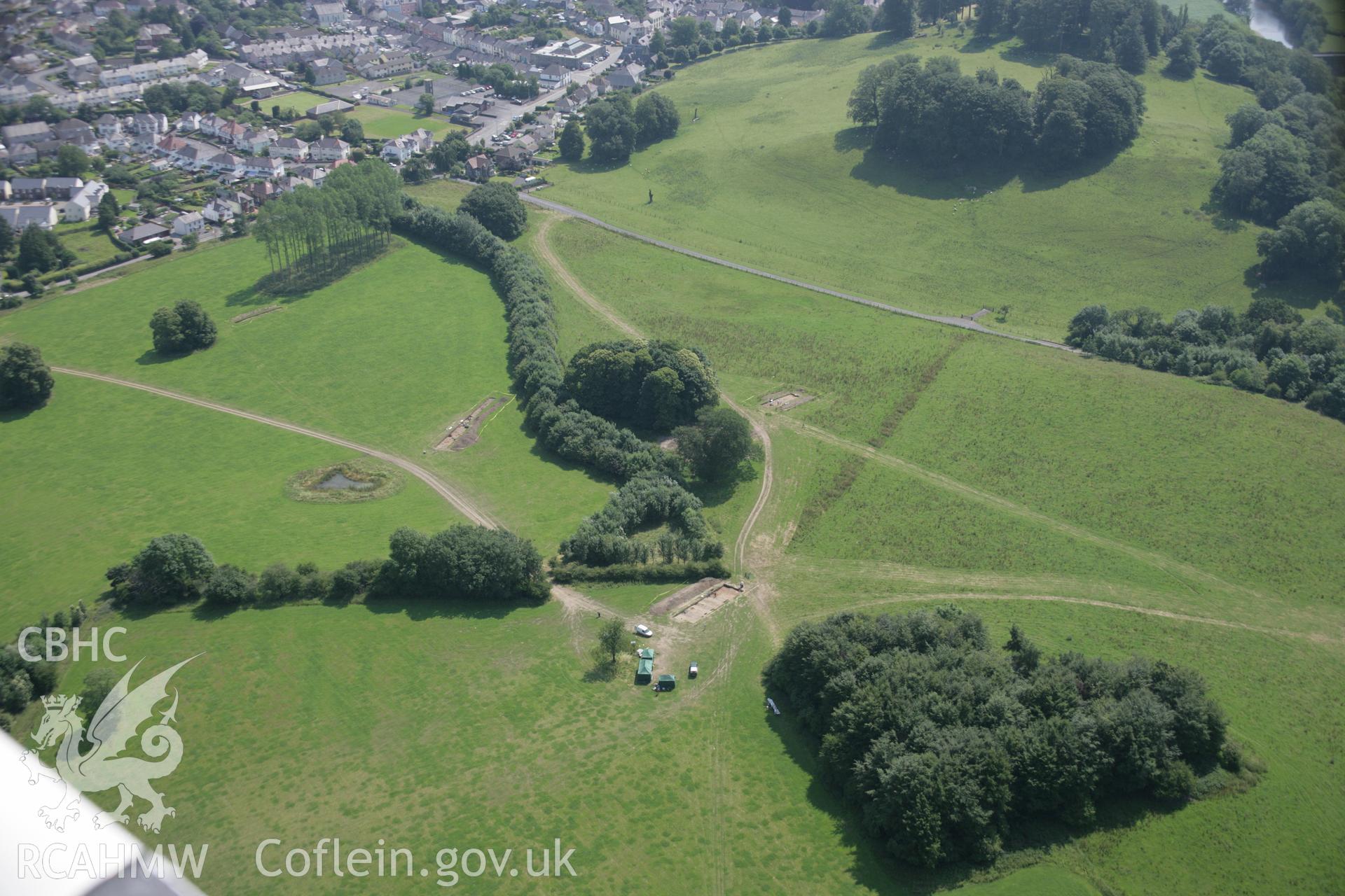 RCAHMW colour oblique aerial photograph of Dinefwr Park Roman Forts. The main excavation trenches viewed from the west. Taken on 11 July 2005 by Toby Driver