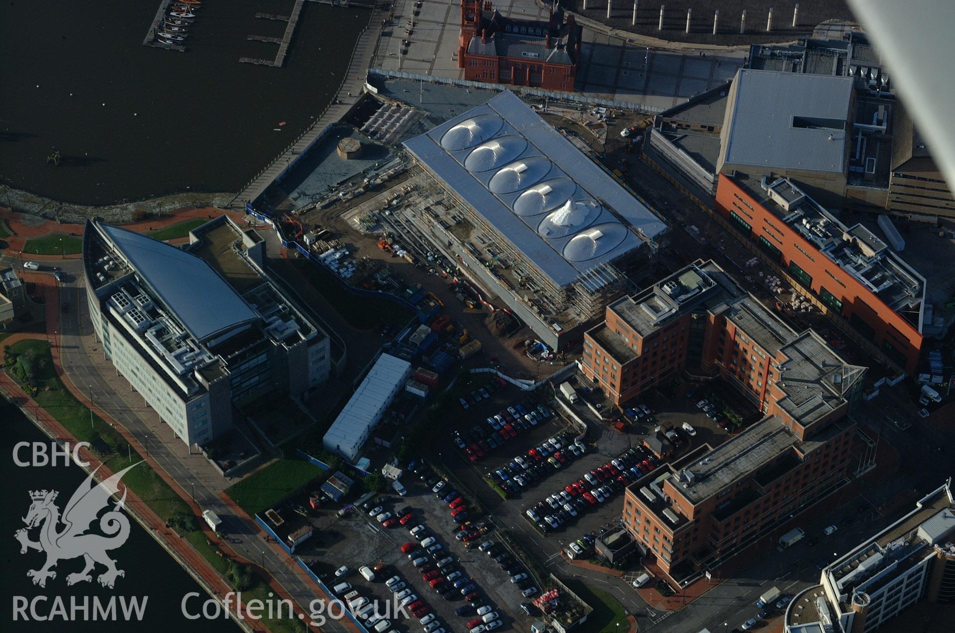 RCAHMW colour oblique aerial photograph of the Senedd, Cardiff Bay taken on 13/01/2005 by Toby Driver