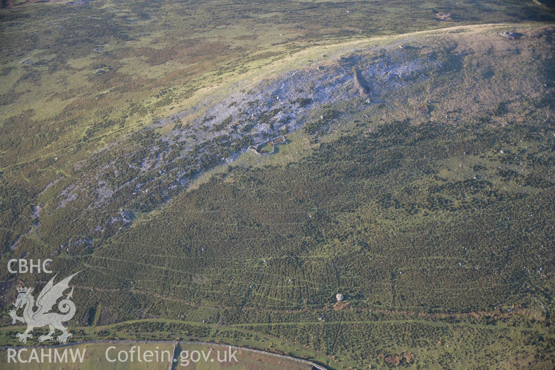 RCAHMW colour oblique aerial photograph of Moel Faban Settlement and cairnfield, viewed from the south-east. Taken on 21 November 2005 by Toby Driver