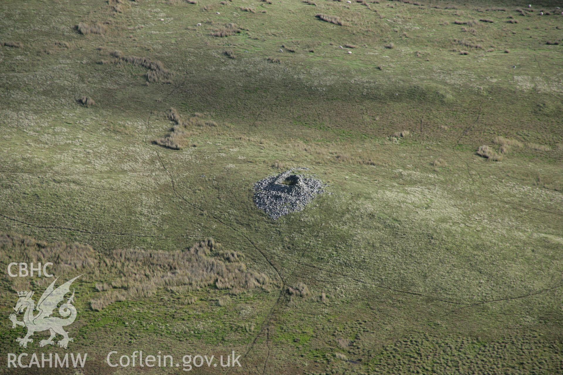 RCAHMW colour oblique aerial photograph of Banc Ystrad Wen, Cairn IV, viewed from the east. Taken on 13 October 2005 by Toby Driver