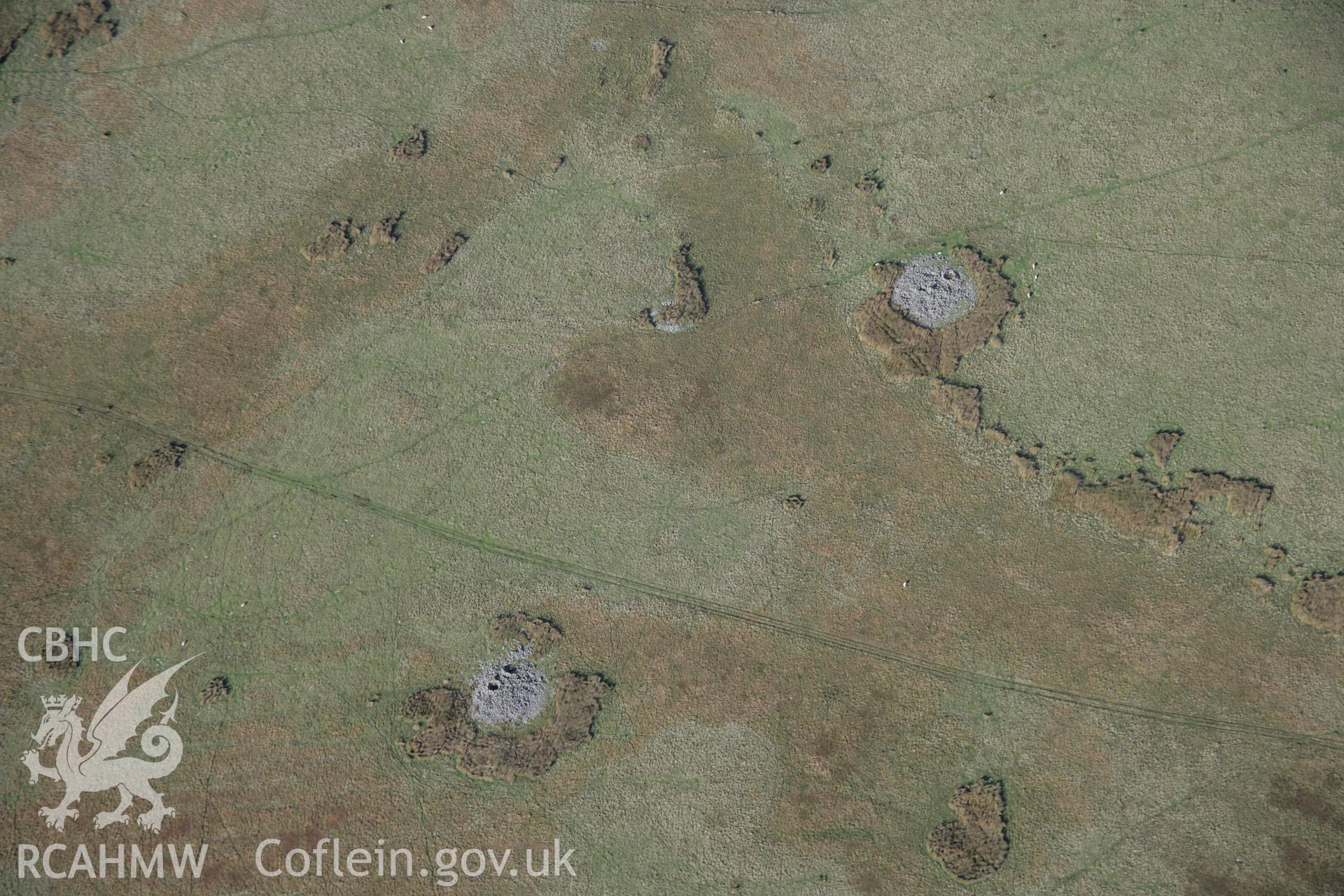 RCAHMW colour oblique aerial photograph of Carnau Cefn-y-Ffordd, Cairn VI, viewed from the south-west. Taken on 13 October 2005 by Toby Driver