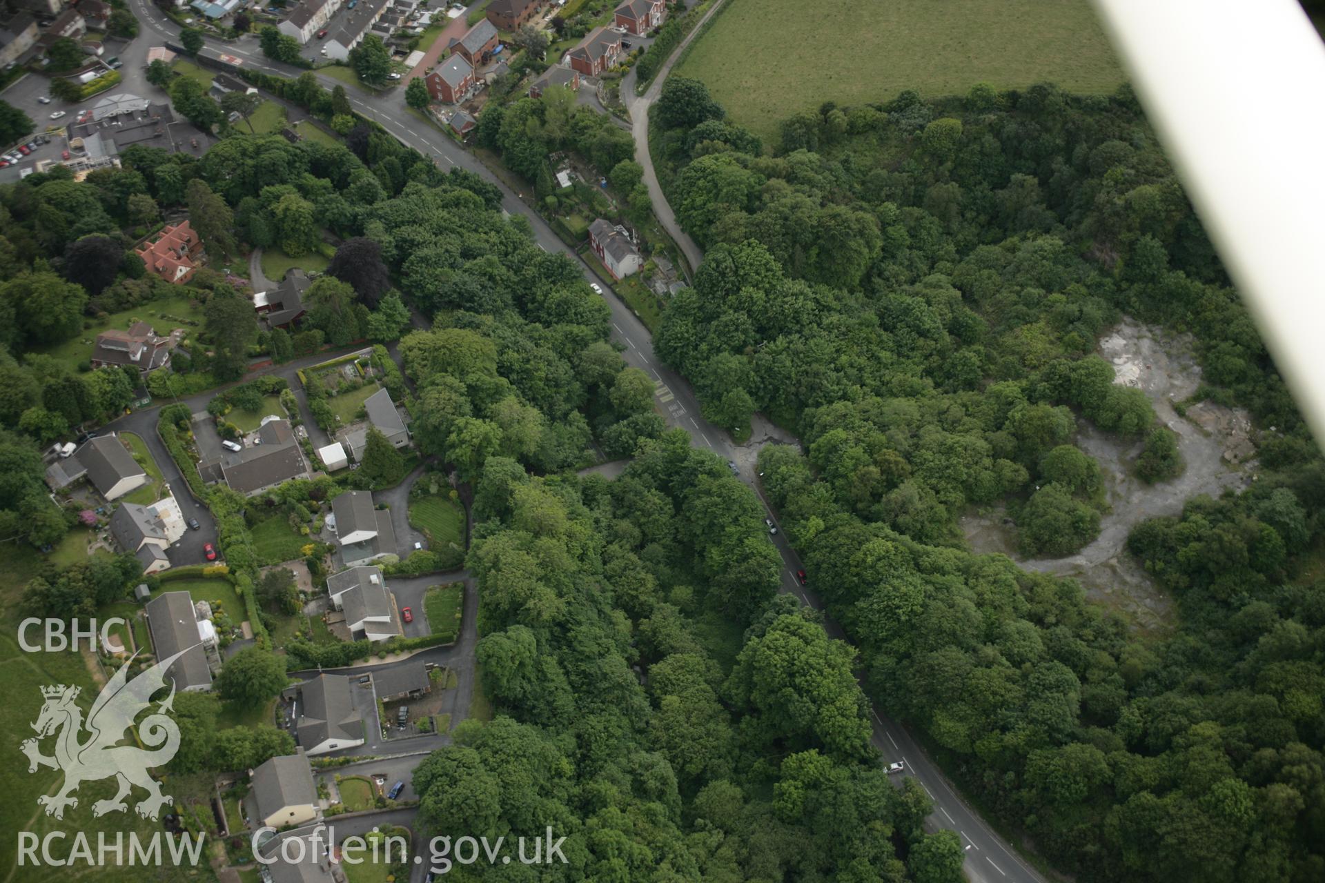 RCAHMW colour oblique aerial photograph of The Old Furnace Ironworks, Llanelli. A high view from the north. Taken on 09 June 2005 by Toby Driver