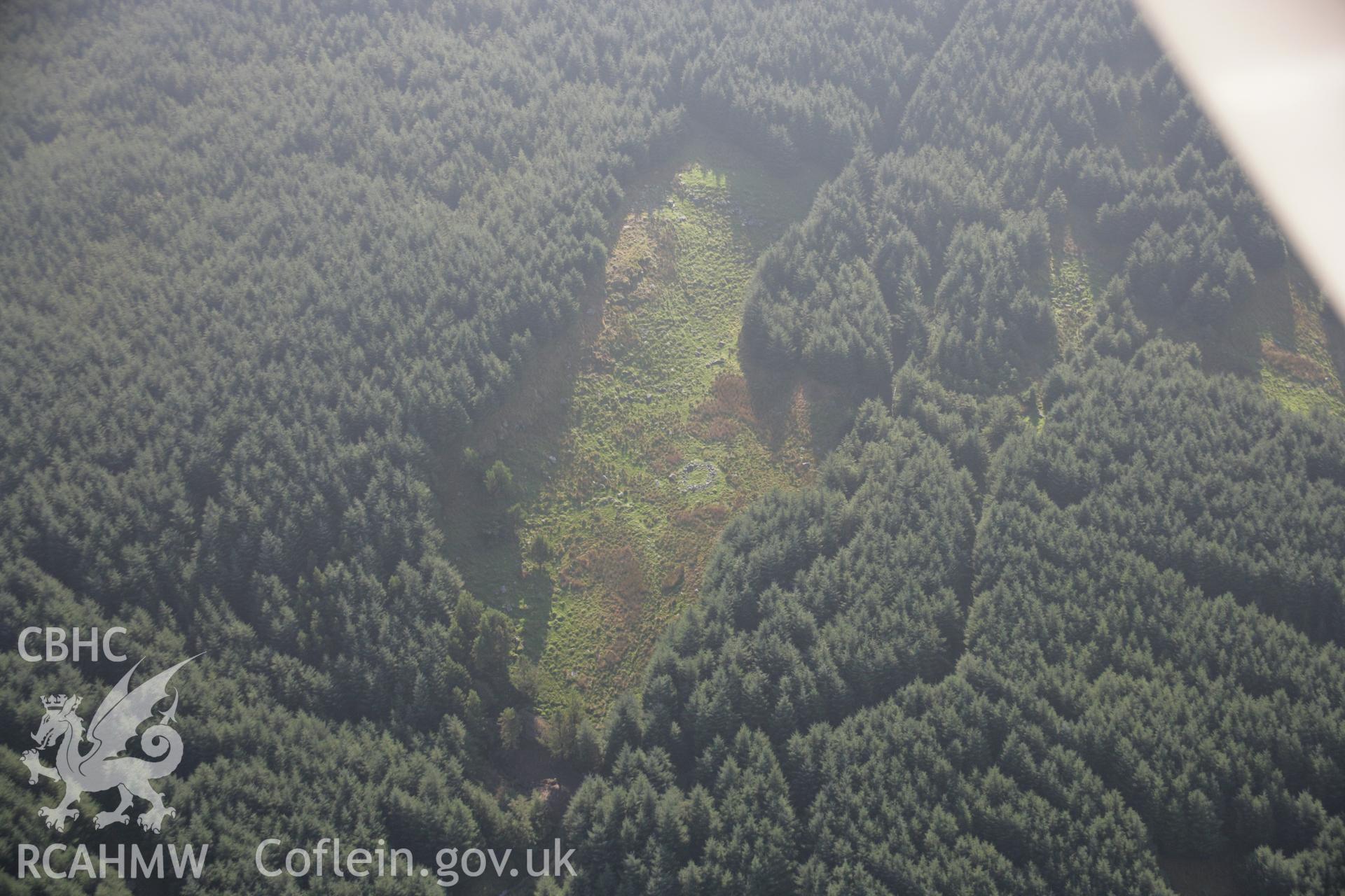 RCAHMW colour oblique aerial photograph of hut circles to the southeast of Cyfannedd Fawr, viewed looking south-west Taken on 17 October 2005 by Toby Driver