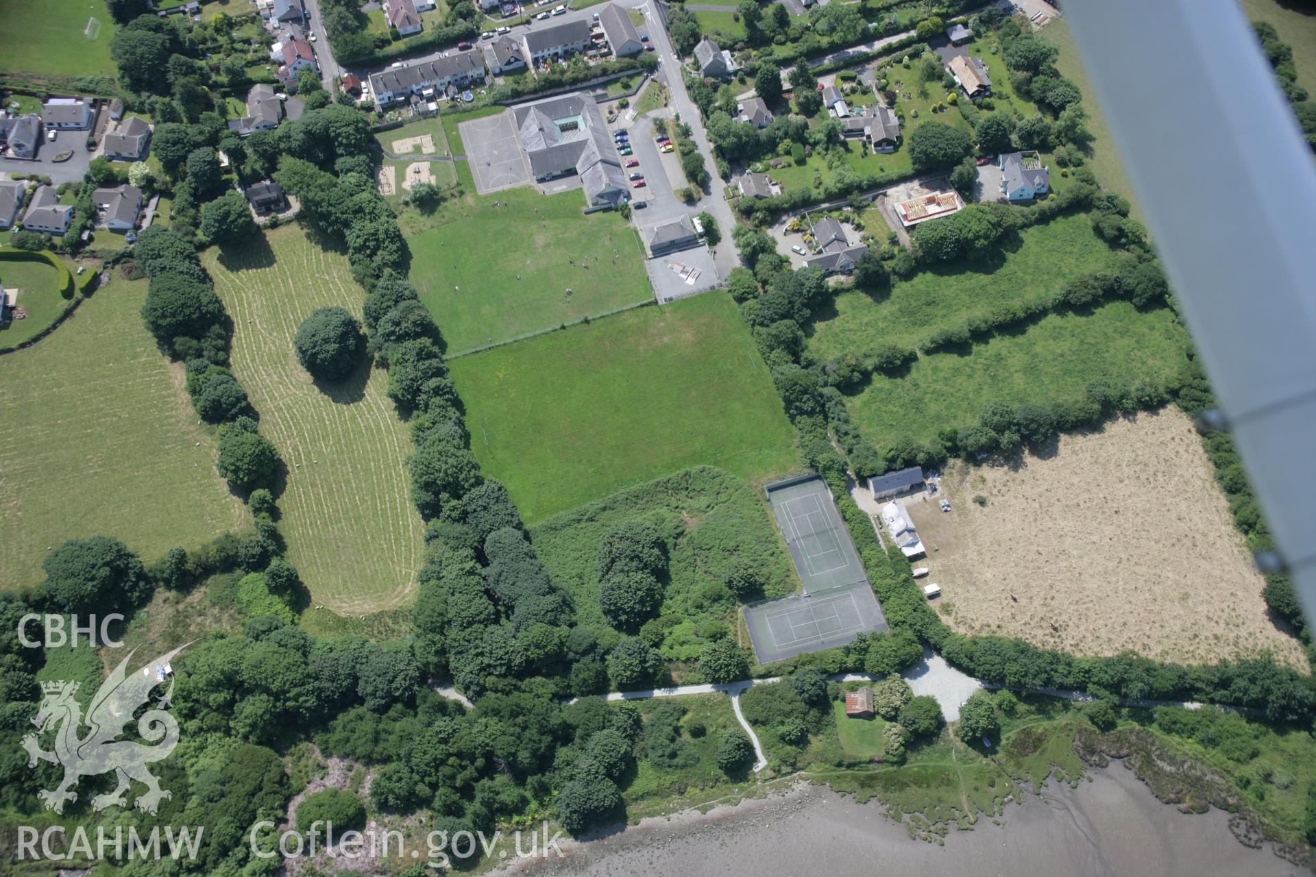 RCAHMW colour oblique aerial photograph showing ringwork of Old Castle, Newport, viewed from the north. Taken on 11 July 2005 by Toby Driver