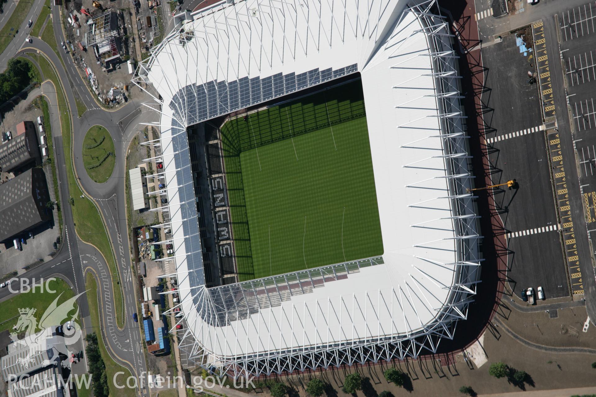 RCAHMW colour oblique aerial photograph of Morfa Stadium Sports Ground, showing new stadium, Swansea. Taken on 22 June 2005 by Toby Driver