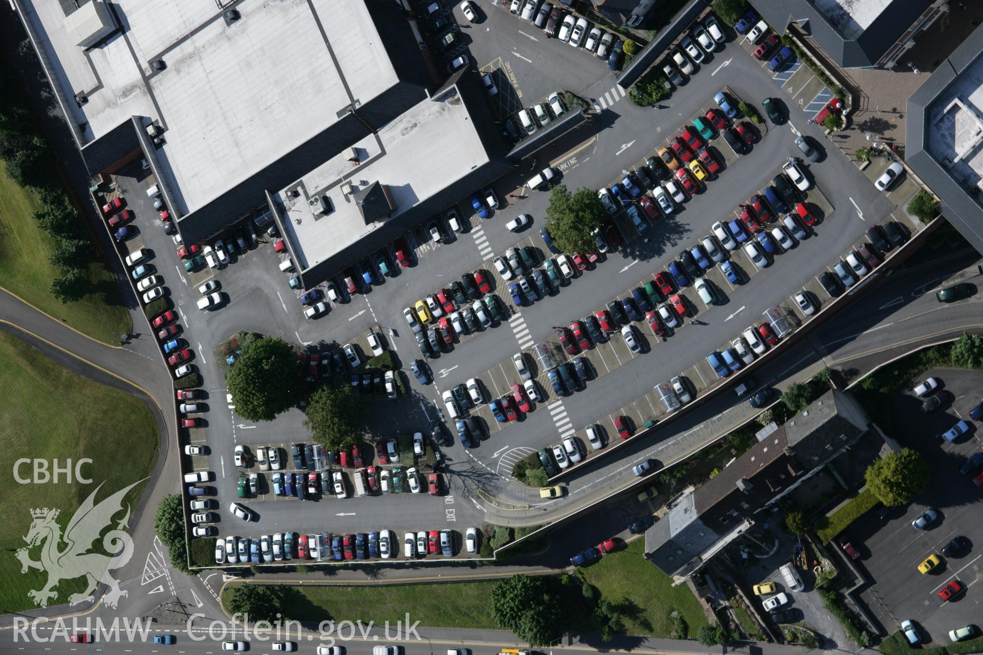 RCAHMW colour oblique aerial photograph of The Bulwarks showing the southern end with a car park. Taken on 09 June 2005 by Toby Driver