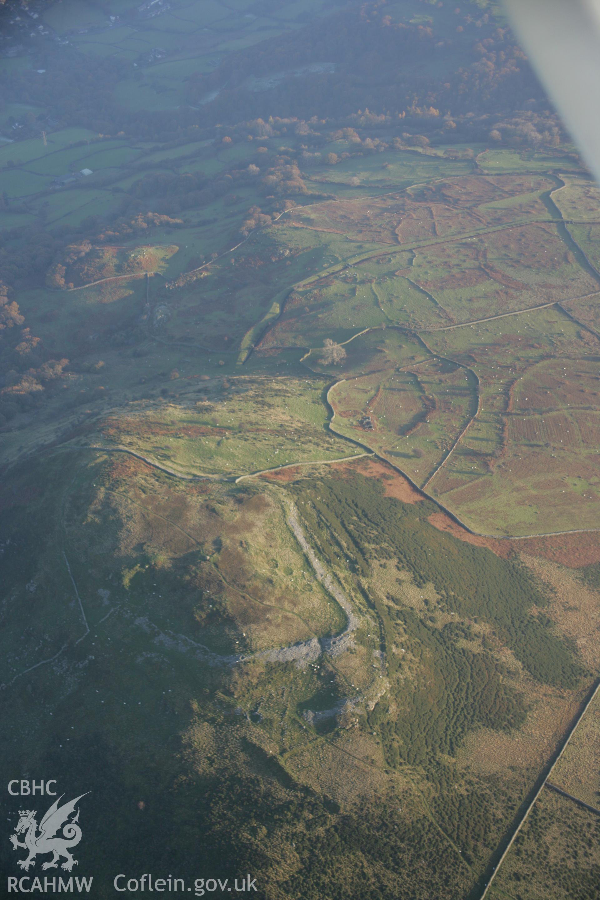 RCAHMW colour oblique aerial photograph of Pen-y-Gaer Hillfort, viewed from the north-west. Taken on 21 November 2005 by Toby Driver