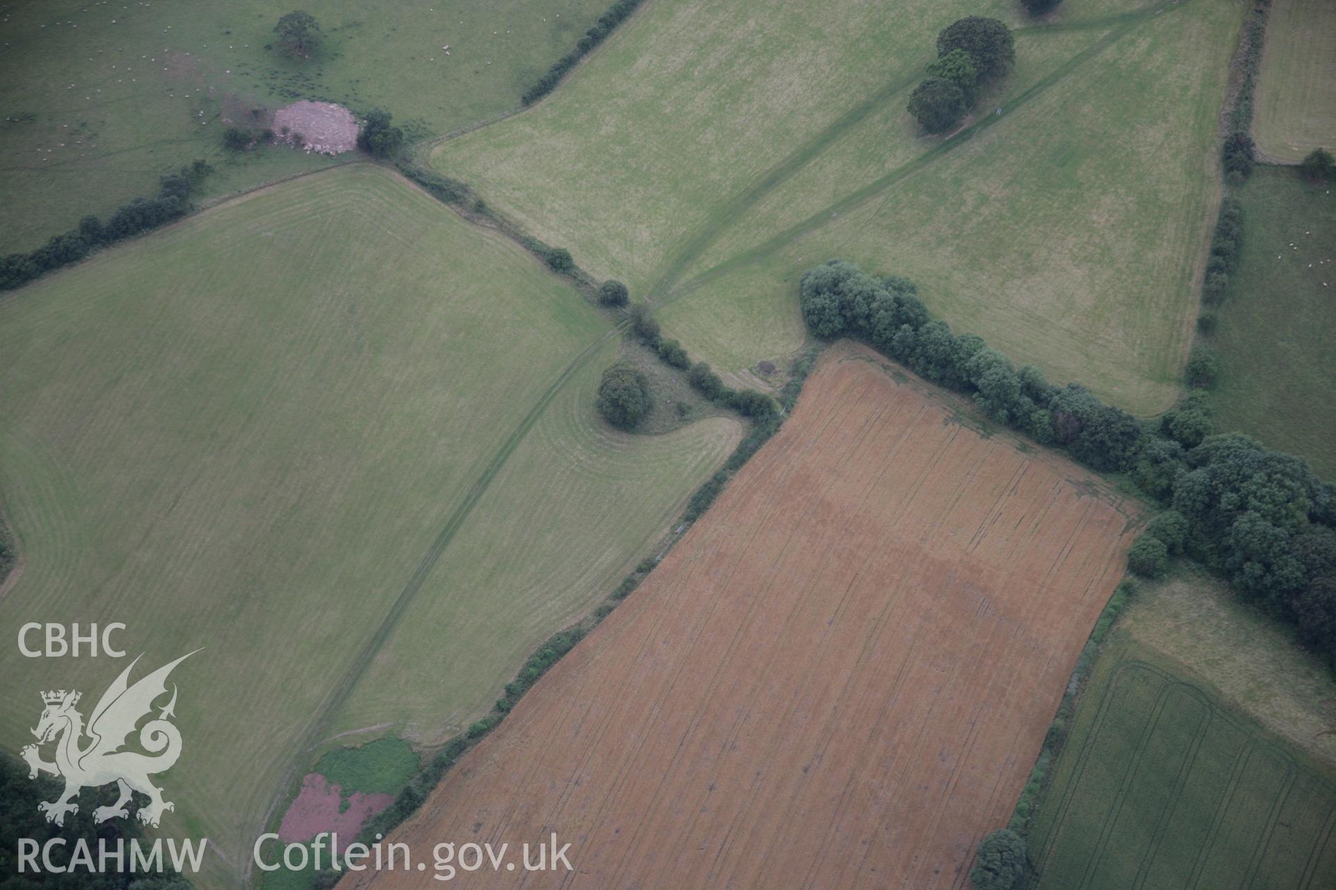 RCAHMW digital colour oblique photograph of Pipton chambered long cairn viewed from the north-east. Taken on 07/07/2005 by T.G. Driver.