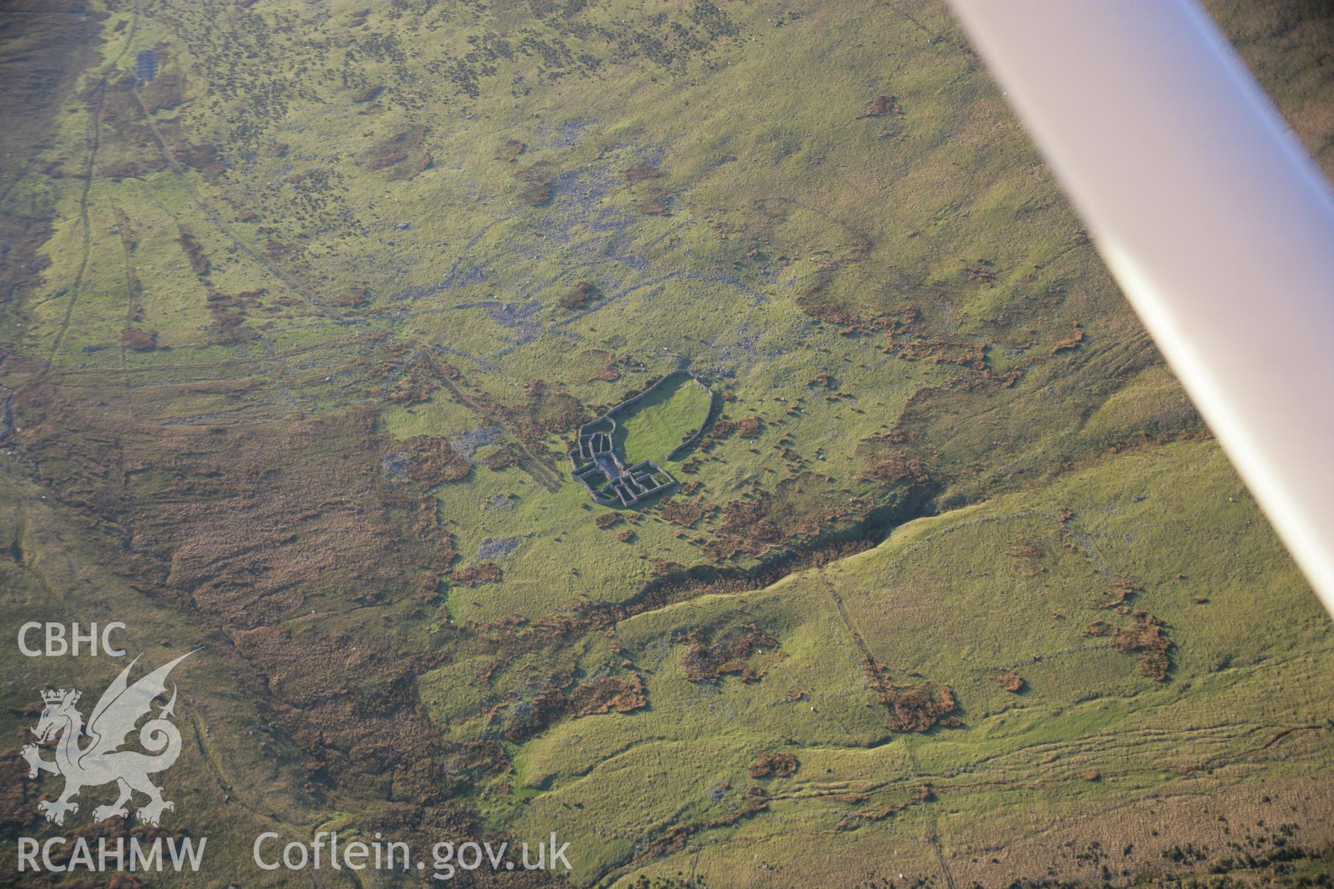 RCAHMW colour oblique aerial photograph of the Cwm Caseg prehistoric settlement showing the wandering walls. Viewed from the east. Taken on 21 November 2005 by Toby Driver