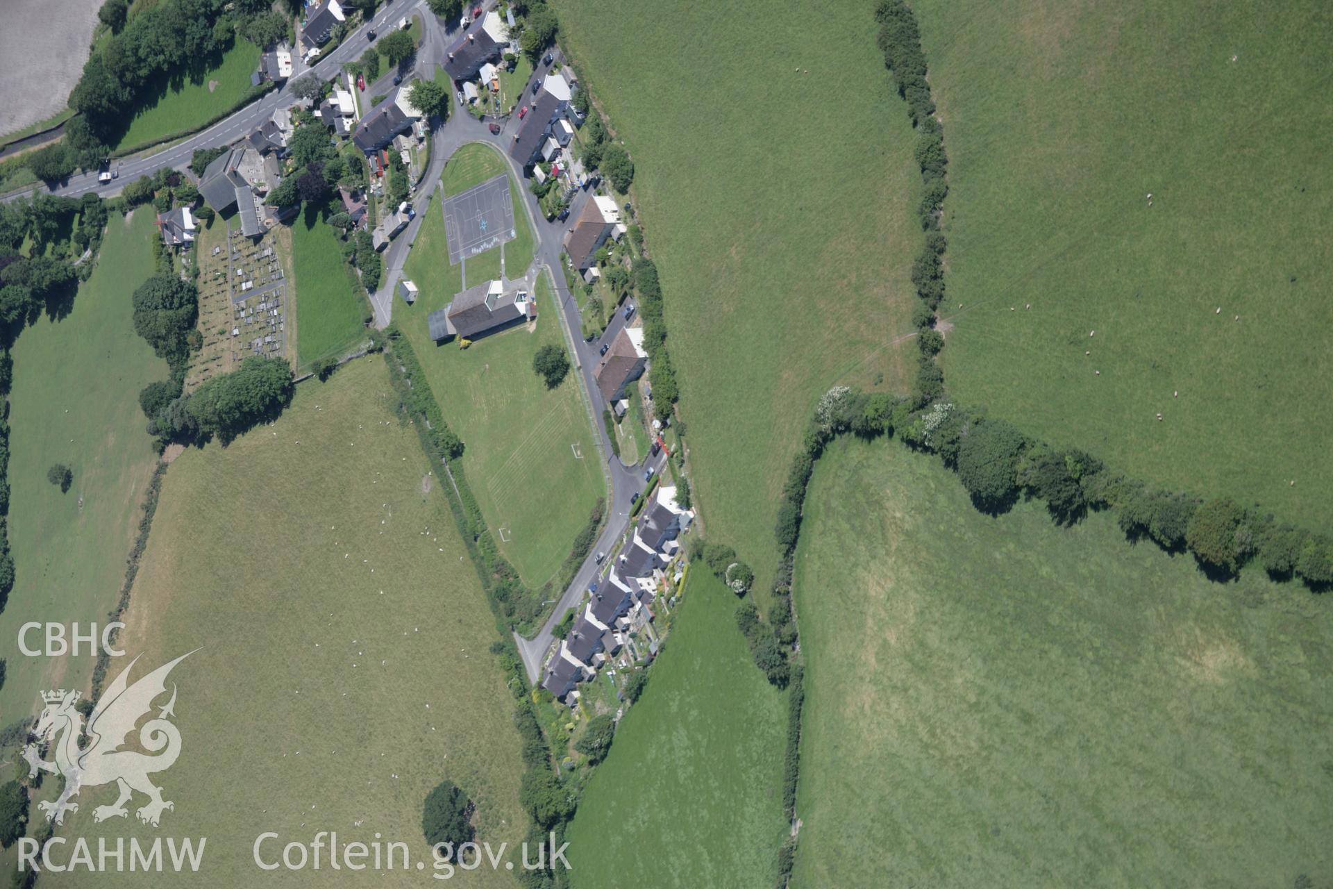 RCAHMW colour oblique aerial photograph of Pen-Llwyn Roman Fort and Ysgol Penlleyn, viewed from the north-west. Taken on 23 June 2005 by Toby Driver