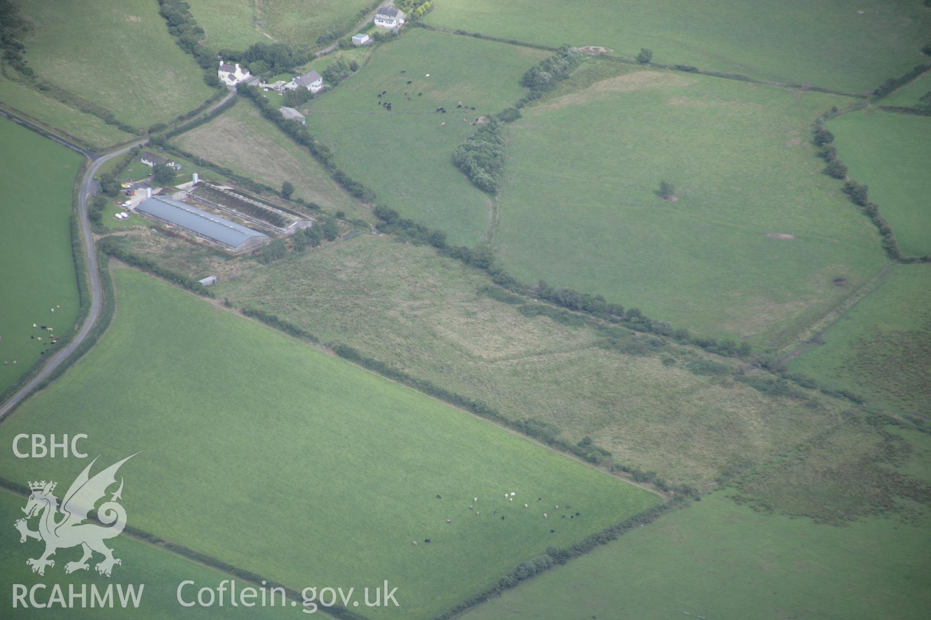 RCAHMW digital colour oblique photograph of Hendrefor Earthwork viewed from the north-west. Taken on 02/08/2005 by T.G. Driver.