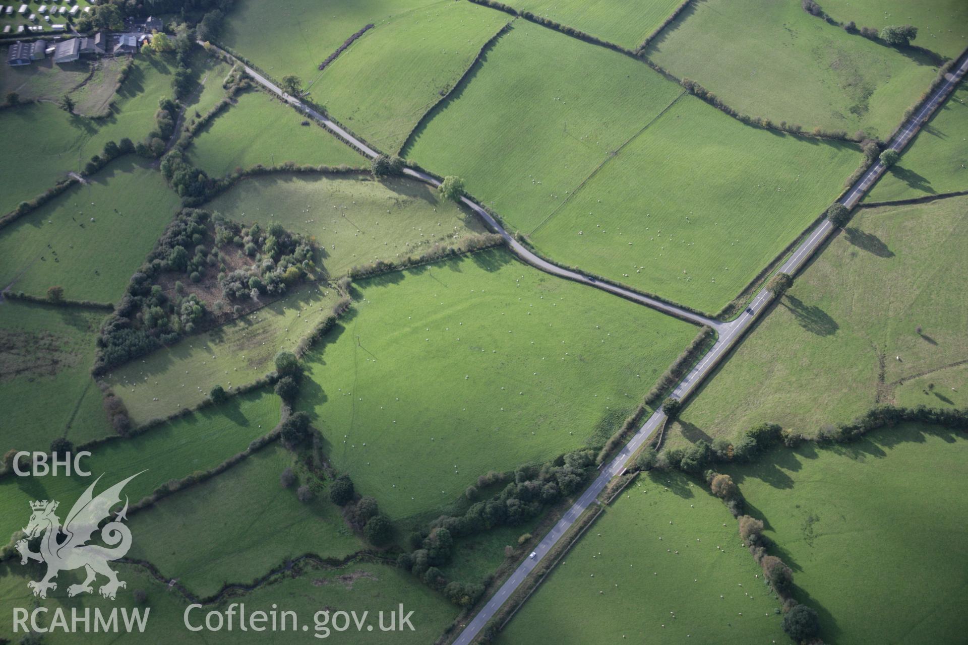 RCAHMW colour oblique aerial photograph of The Gaer, Dolau, from the east. Taken on 13 October 2005 by Toby Driver