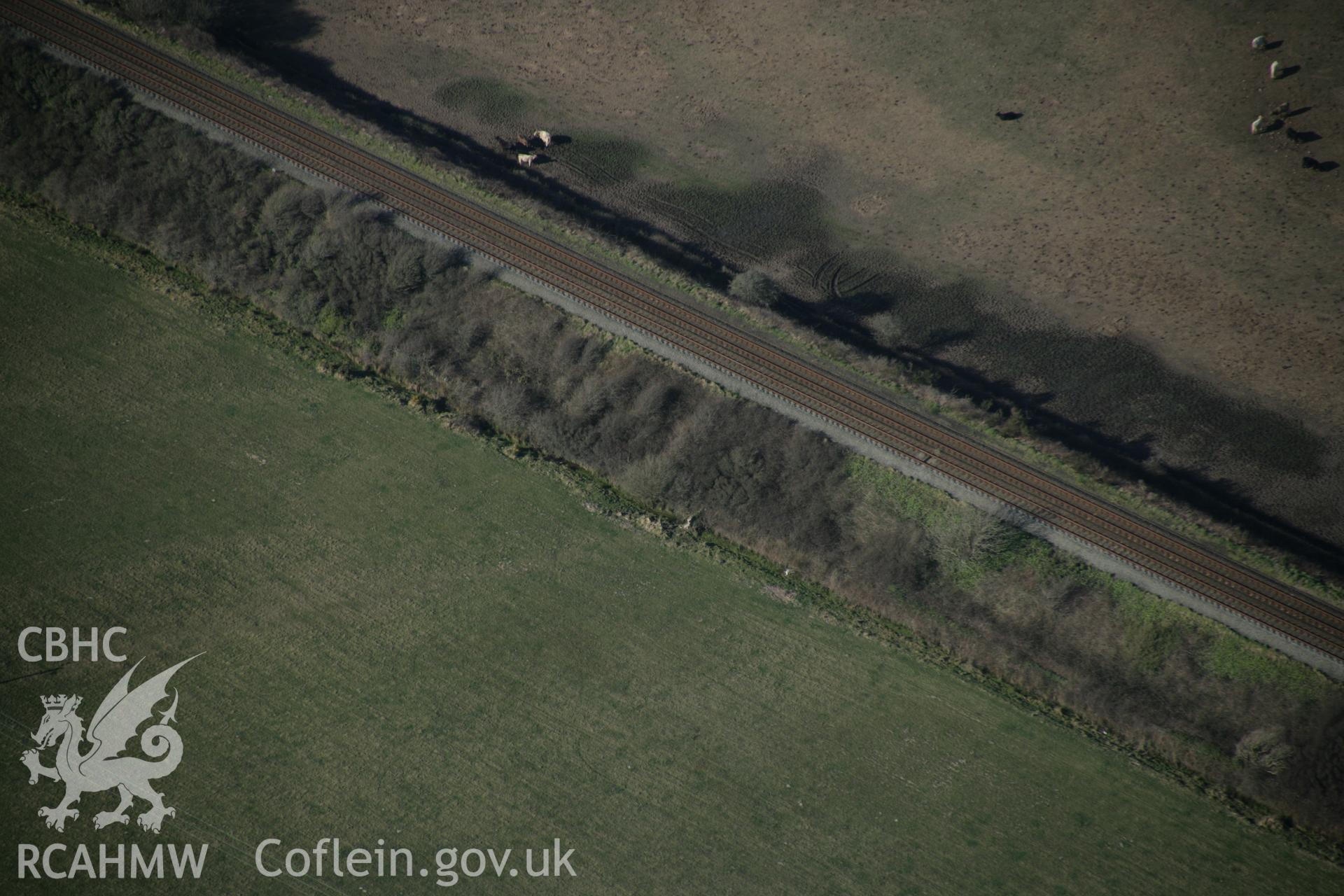 RCAHMW digital colour oblique photograph of the standing stone at Malltraeth. Taken on 20/03/2005 by T.G. Driver.