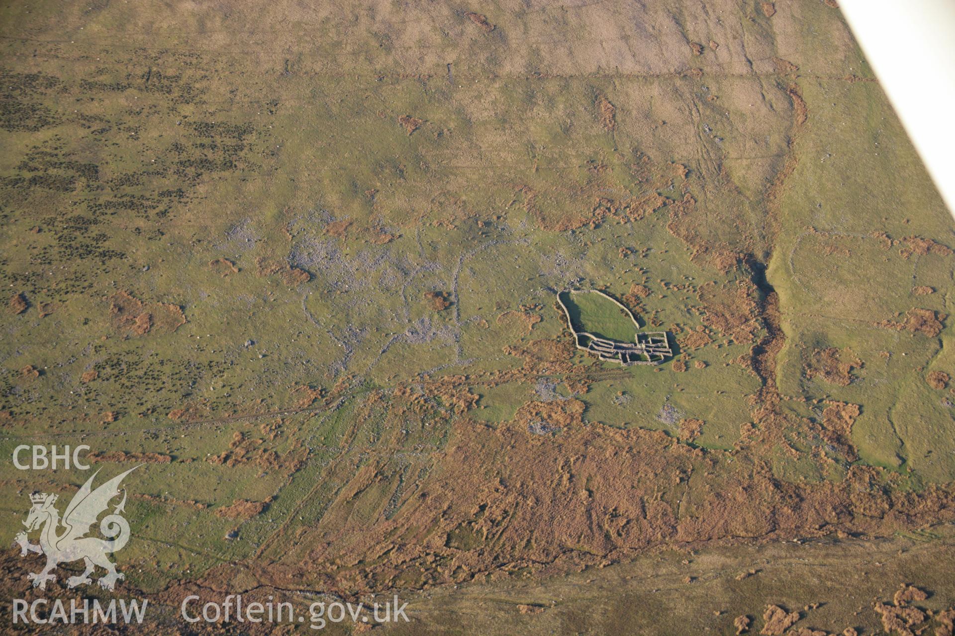 RCAHMW colour oblique aerial photograph of the Cwm Caseg prehistoric settlement showing the wandering walls. Viewed from the south. Taken on 21 November 2005 by Toby Driver