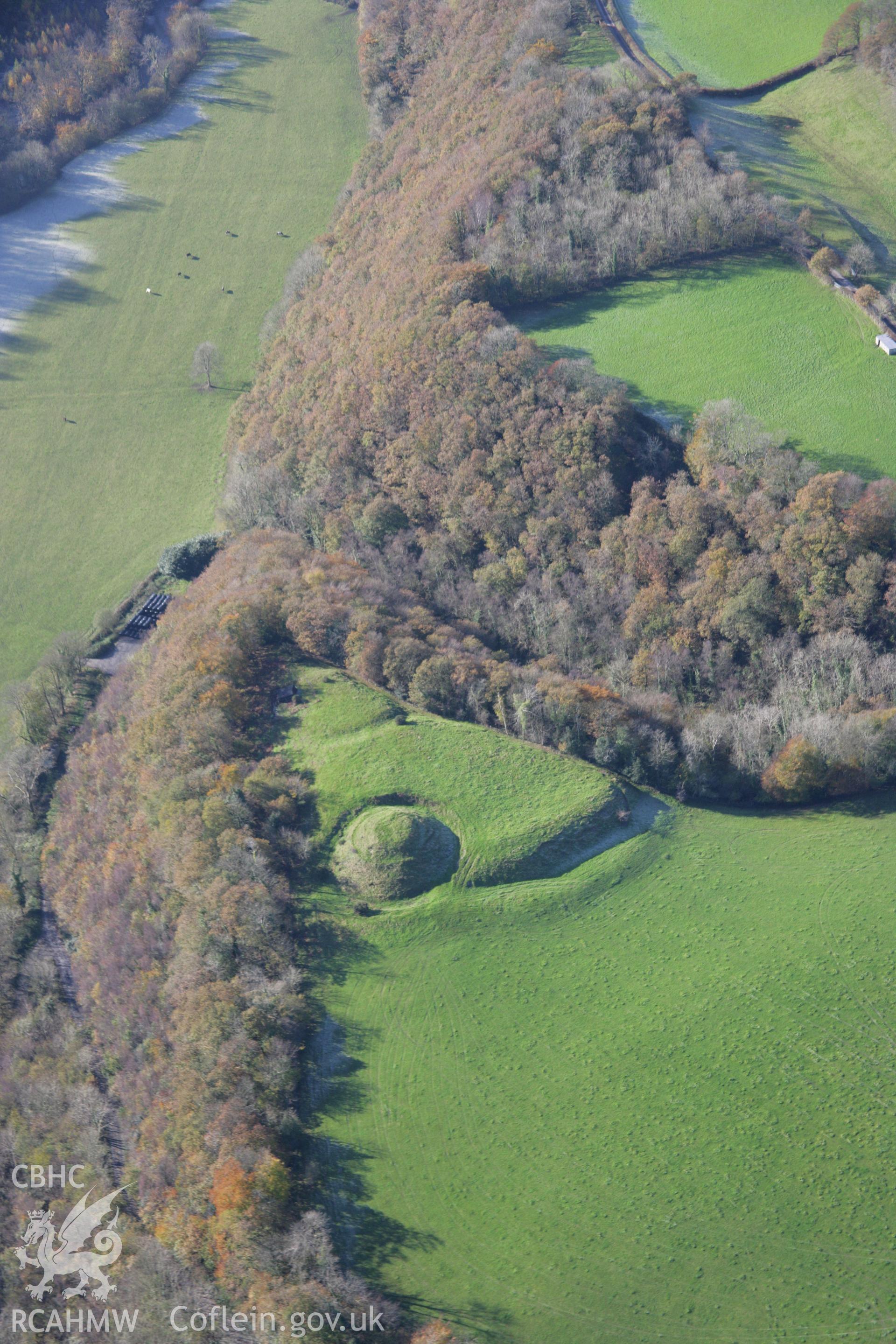 RCAHMW colour oblique photograph of Allt y Ferin, motte and bailey castle, view from north-east. Taken by Toby Driver on 17/11/2005.