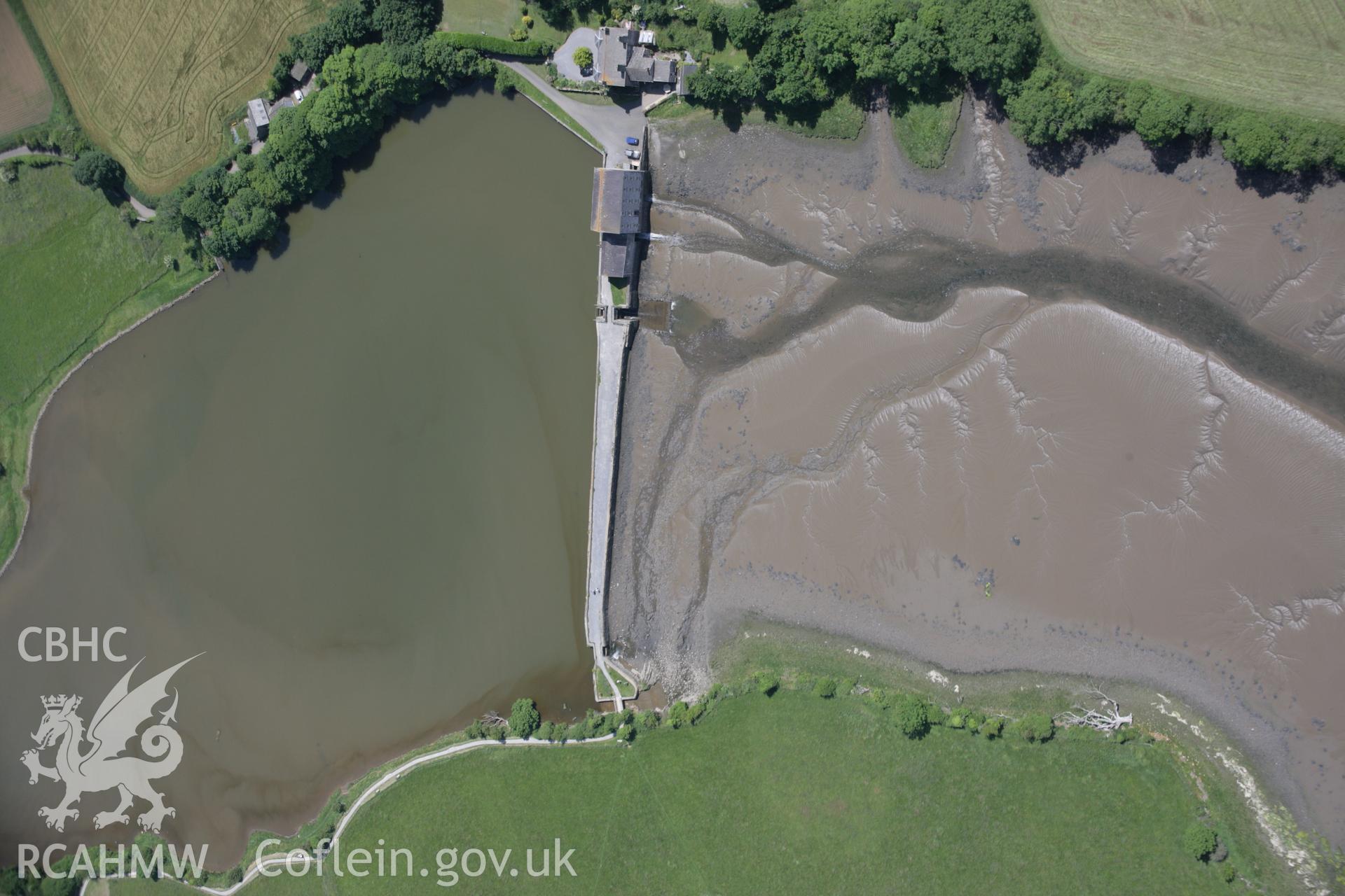 RCAHMW colour oblique aerial photograph of Carew Tide Mill from the west. Taken on 22 June 2005 by Toby Driver