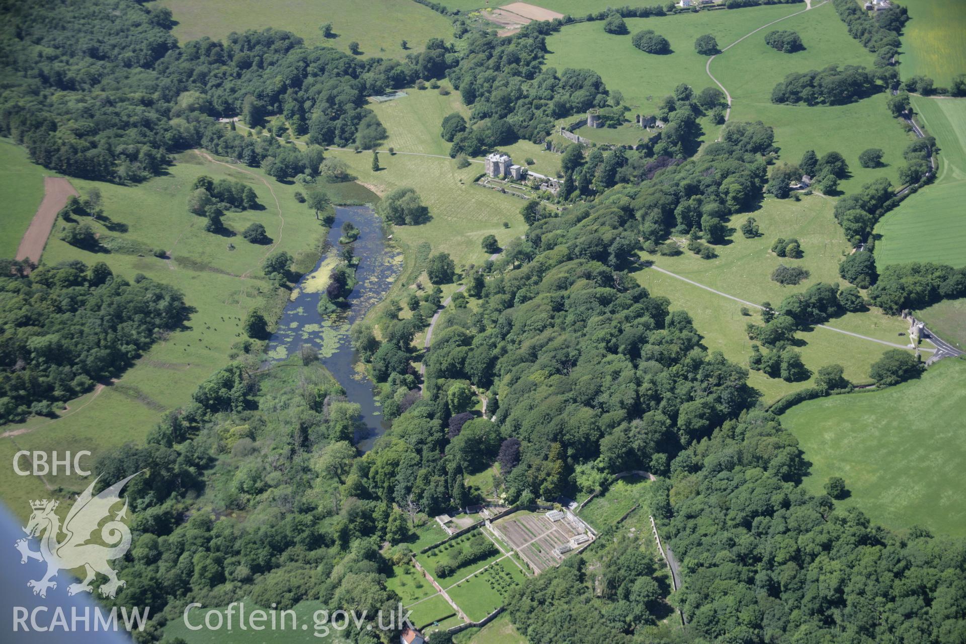 RCAHMW colour oblique aerial photograph of Penrice Castle Garden, in general view from the south-east. Taken on 22 June 2005 by Toby Driver