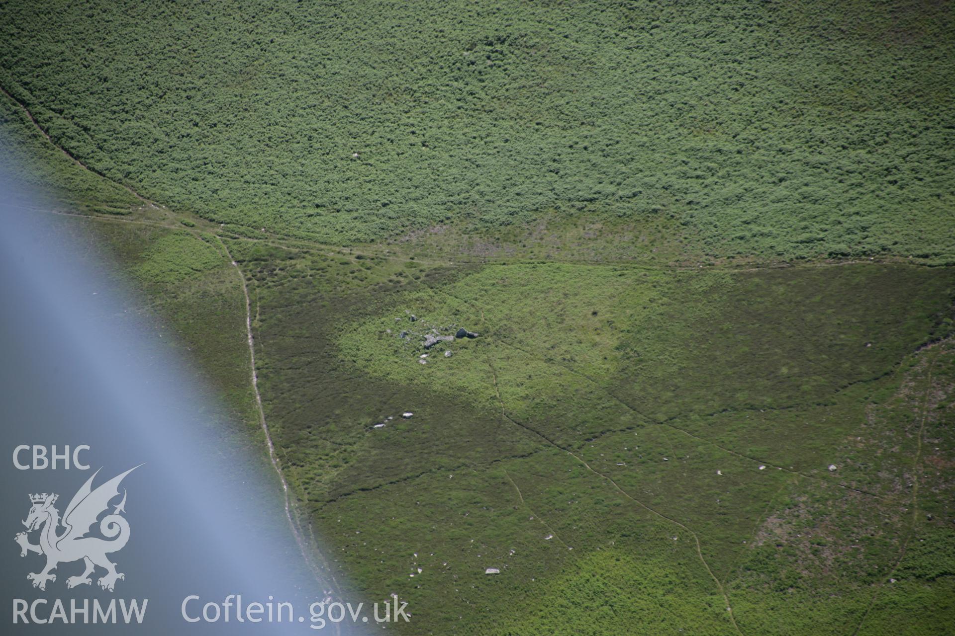 RCAHMW colour oblique aerial photograph of Sweyne's Howes South Cairn, from the north. Taken on 22 June 2005 by Toby Driver