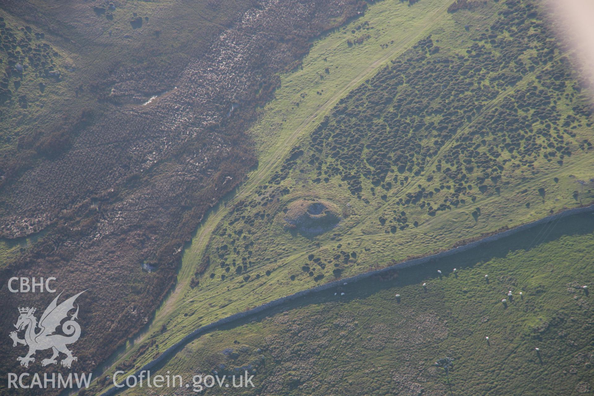 RCAHMW colour oblique aerial photograph of a cairn on Cefn Coch. Taken on 21 November 2005 by Toby Driver