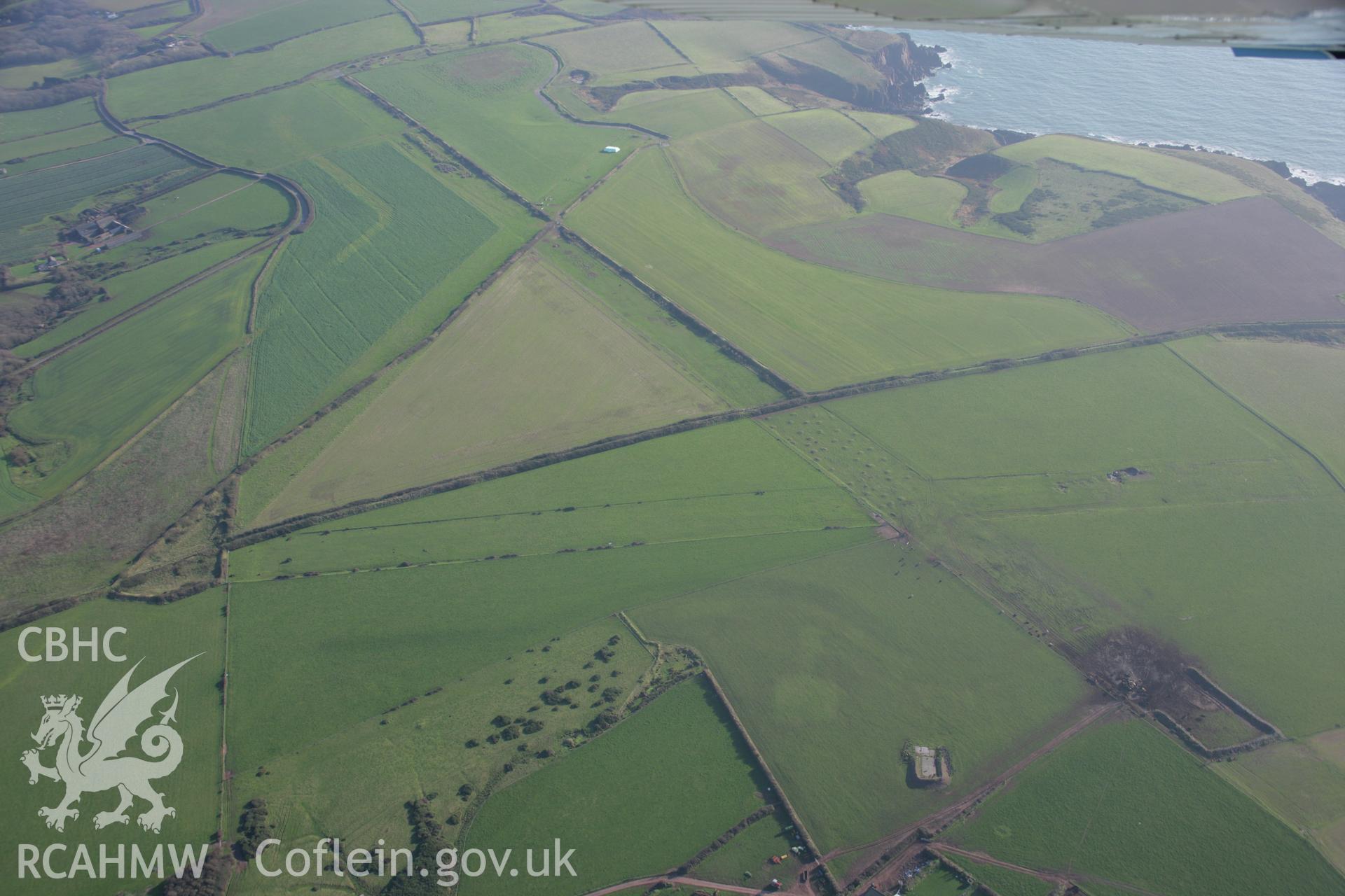 RCAHMW colour oblique aerial photograph of Angle Airfield from the north-west. Taken on 19 November 2005 by Toby Driver