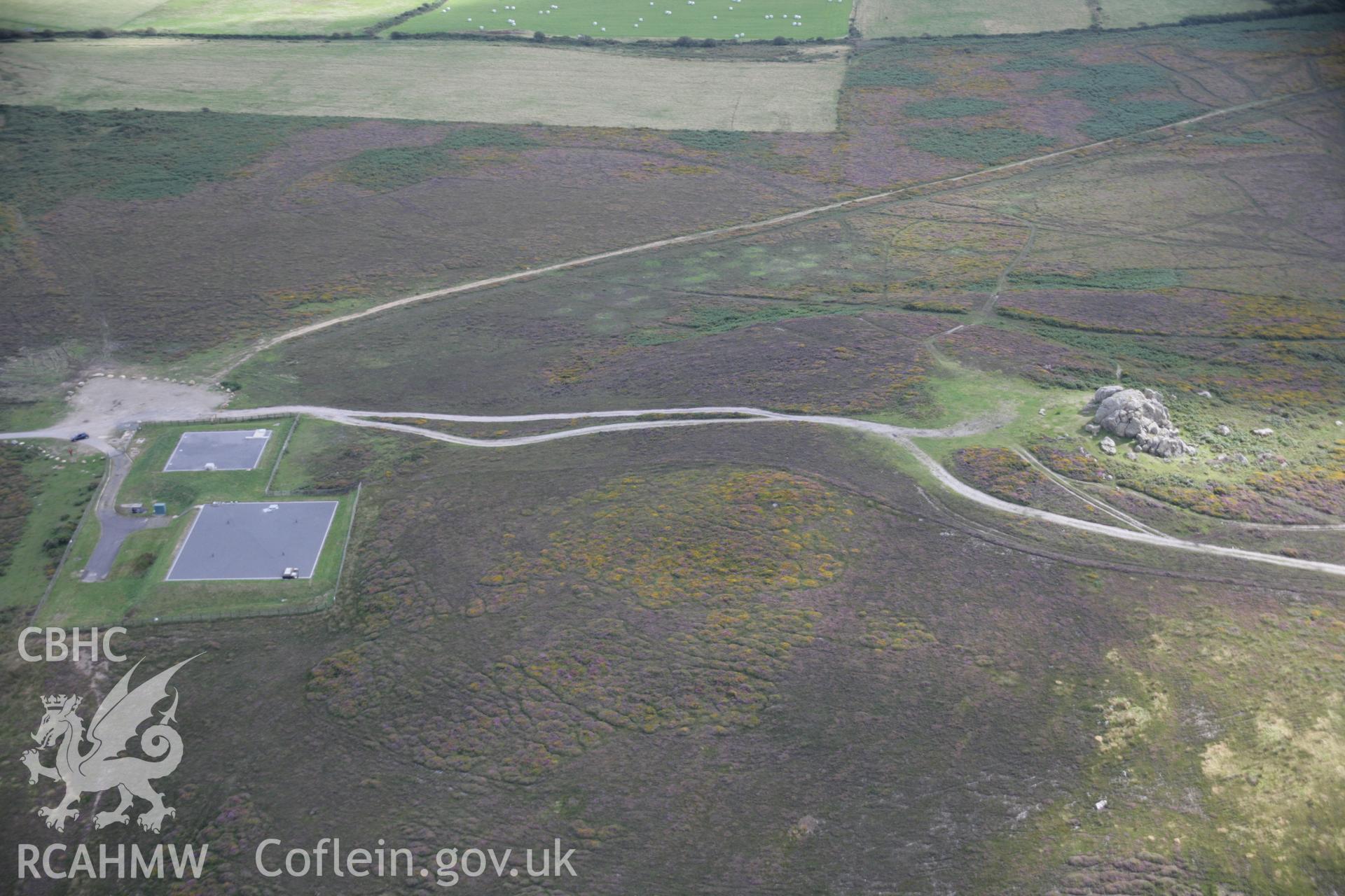 RCAHMW digital colour oblique photograph of Plumstone Mountain Centre Barrow I viewed from the north. Taken on 01/09/2005 by T.G. Driver.