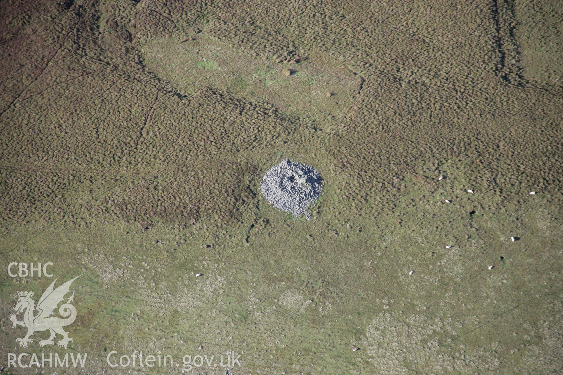 RCAHMW colour oblique aerial photograph of Graig Ddu Cairn I from the south-east. Taken on 13 October 2005 by Toby Driver