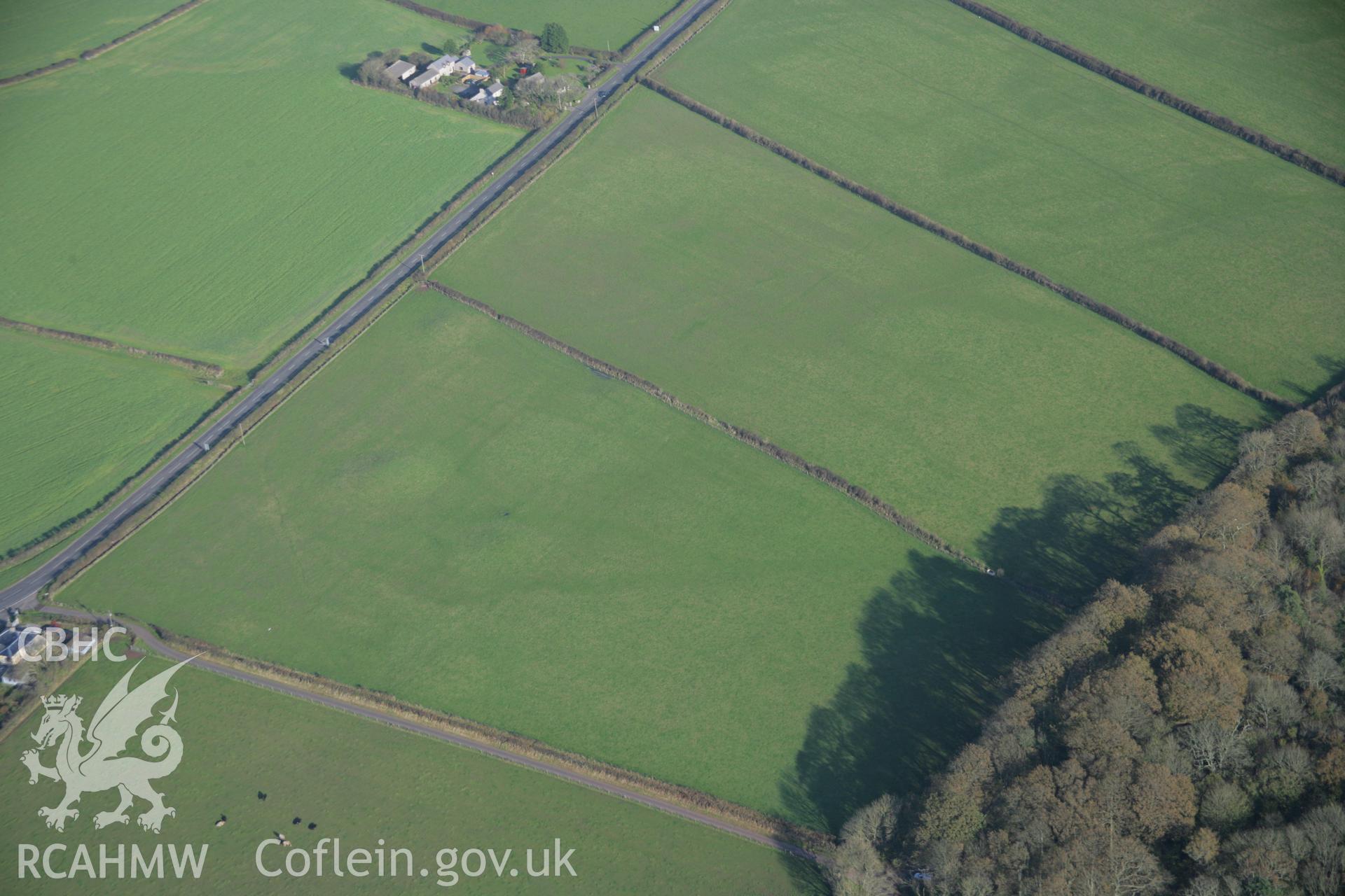 RCAHMW colour oblique aerial photograph of Dry Burrows Barrow Group near Hundleton viewed from the south-west. Taken on 19 November 2005 by Toby Driver