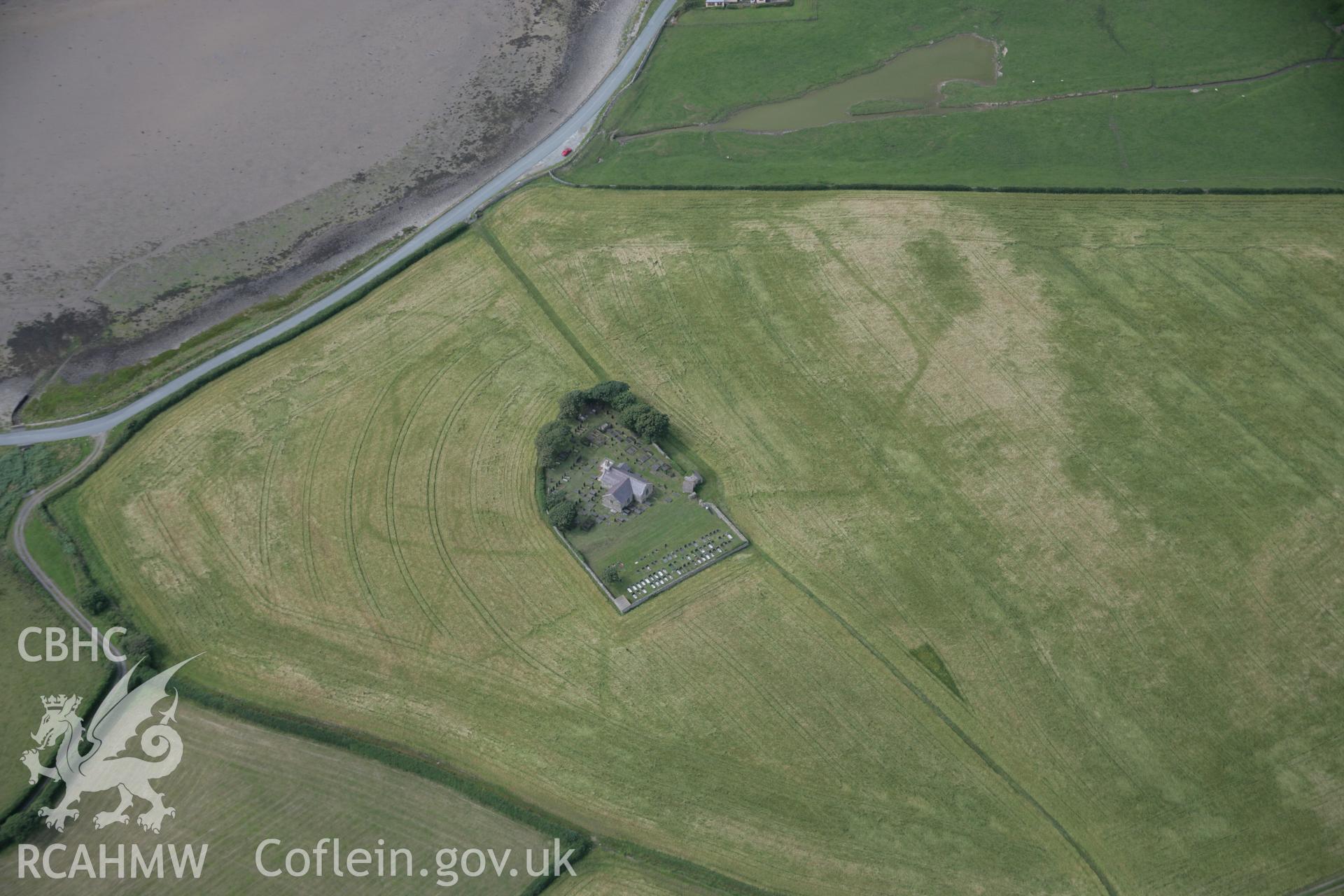 RCAHMW digital colour oblique photograph of St. Baglan's Church Enclosure Complex viewed from the south-east. Taken on 02/08/2005 by T.G. Driver.