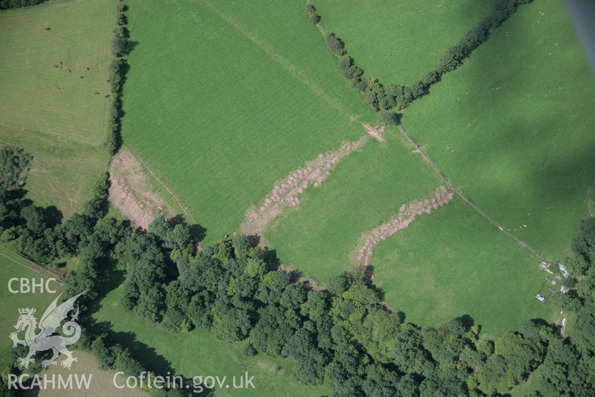 RCAHMW digital colour oblique photograph of Cwm Fforest Long Cairn viewed from the east. Taken on 02/09/2005 by T.G. Driver.