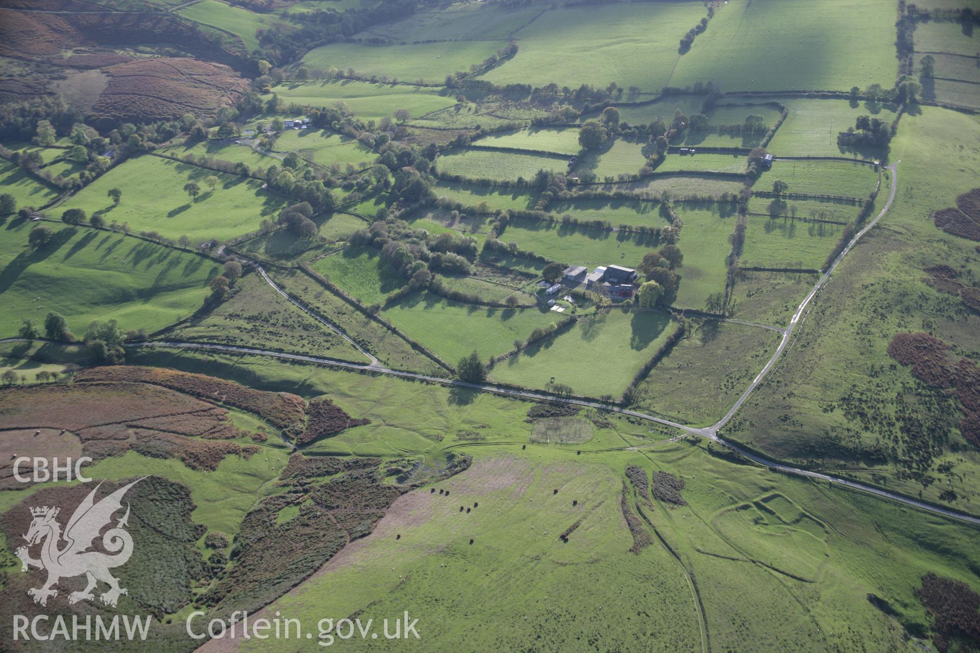 RCAHMW colour oblique aerial photograph of Moelfre Hill Deserted Rural Settlement in general view looking south-west. Taken on 13 October 2005 by Toby Driver