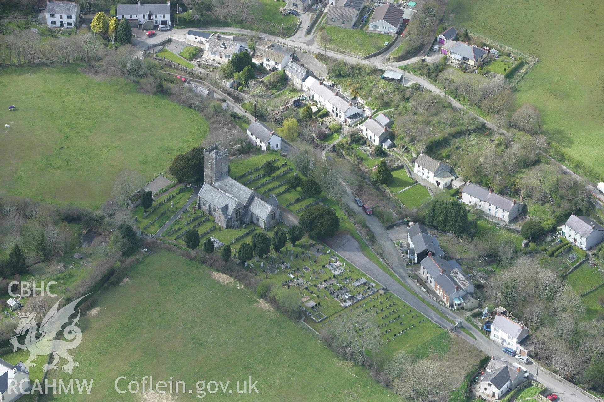 RCAHMW colour oblique photograph of St Llawddog's Church and the Trenagussi Pillar Stone. Taken by Toby Driver on 24/04/2008.