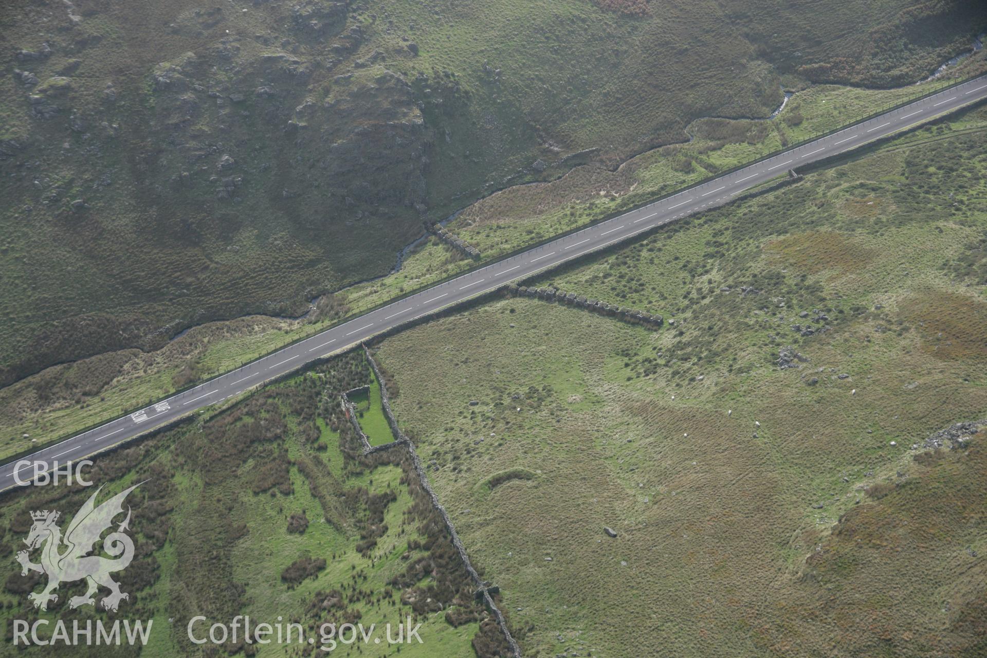 RCAHMW colour oblique aerial photograph of Cube at Brithdir and Islaw'rdre looking south-west. Taken on 17 October 2005 by Toby Driver