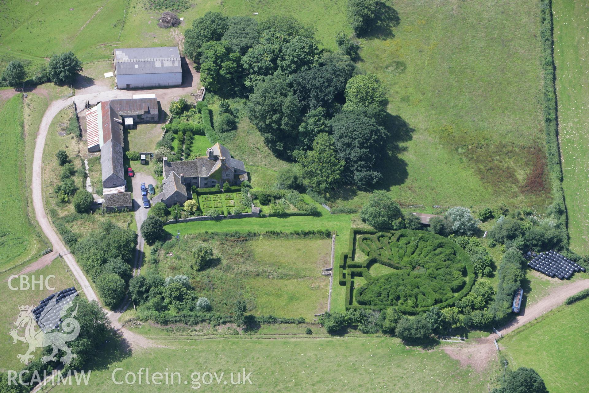 RCAHMW colour oblique photograph of Pen-y-clawdd Court Castle Mound. Taken by Toby Driver on 21/07/2008.