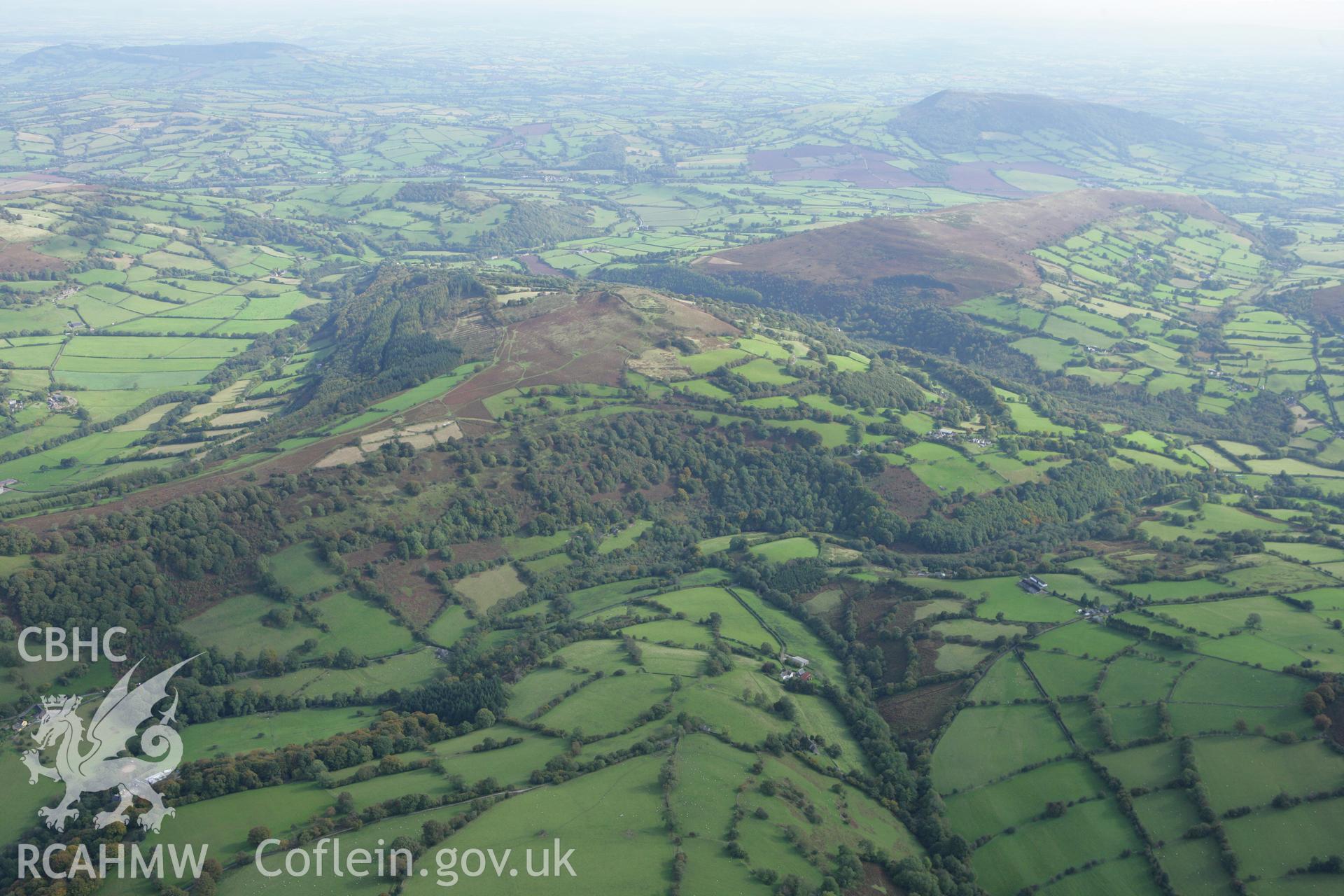 RCAHMW colour oblique photograph of landscape looking east from Tyn-y-llwyn. Taken by Toby Driver on 10/10/2008.