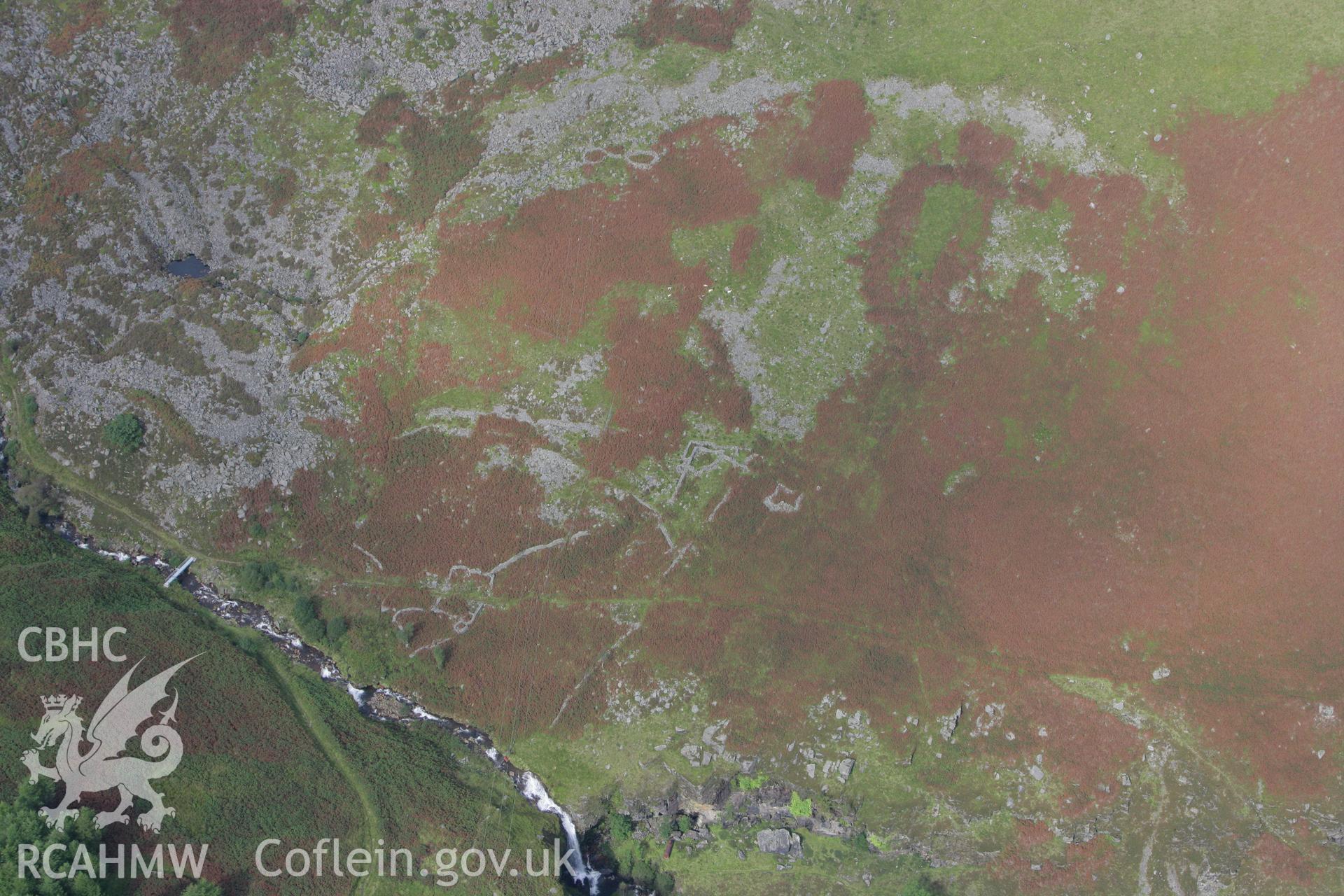 RCAHMW colour oblique photograph of Garreg Lwyd Unenclosed Settlement III, with disused sheepfolds. Taken by Toby Driver on 12/09/2008.