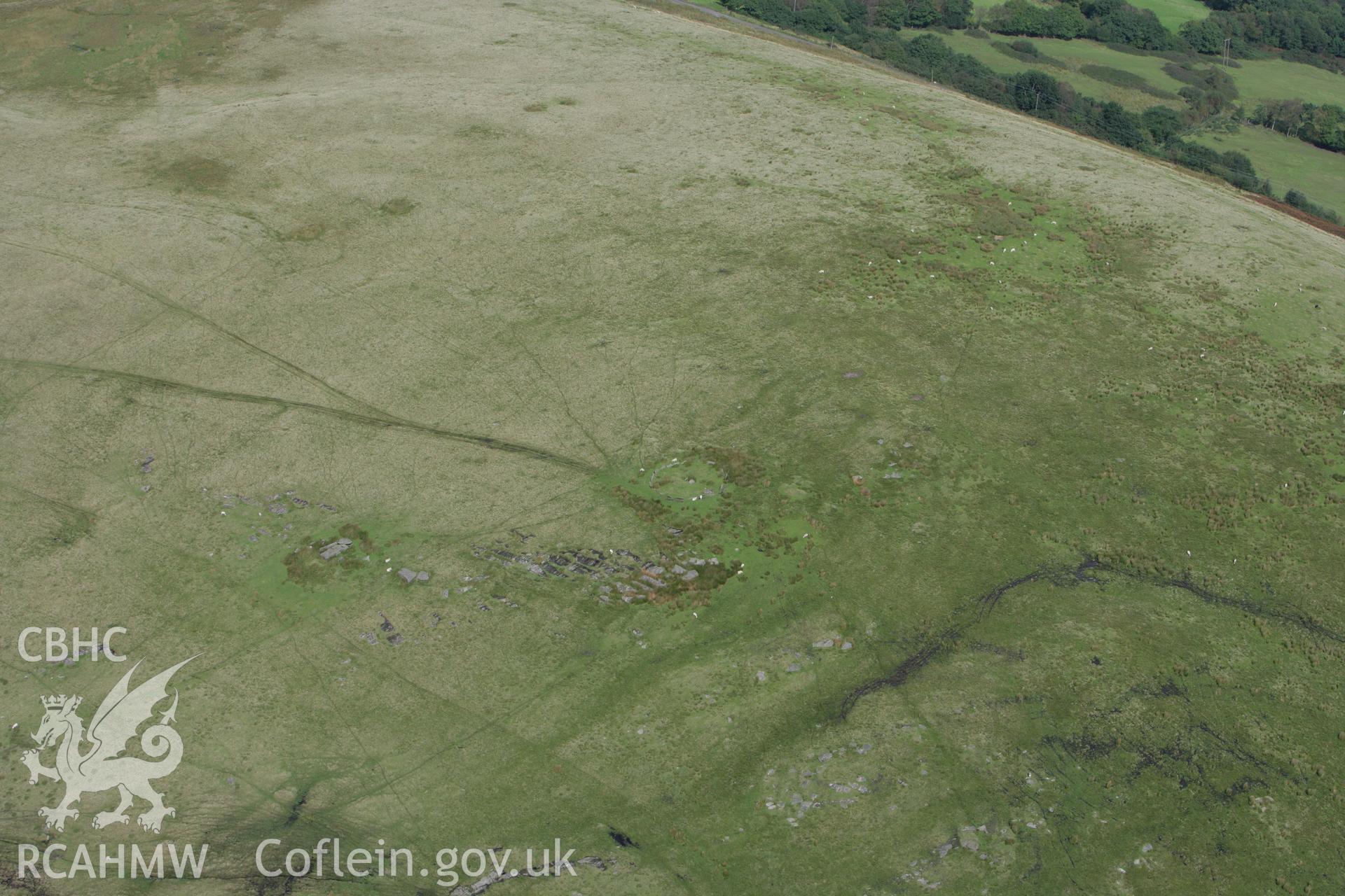 RCAHMW colour oblique photograph of Carn Llechart, with Burial Chamber nearby. Taken by Toby Driver on 12/09/2008.