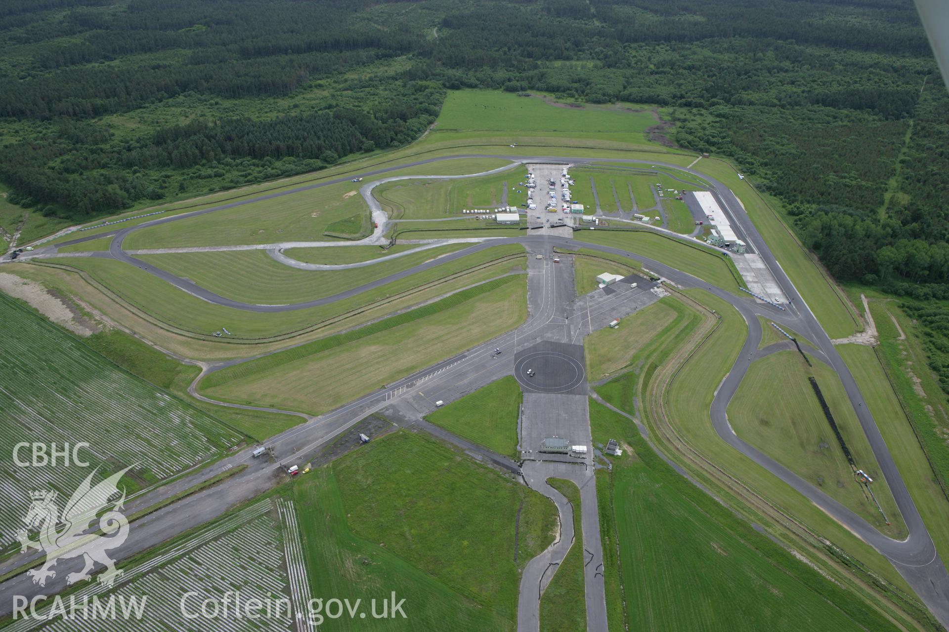 RCAHMW colour oblique photograph of Pembrey Motor Sports Centre, Pembrey Airfield. Taken by Toby Driver on 20/06/2008.