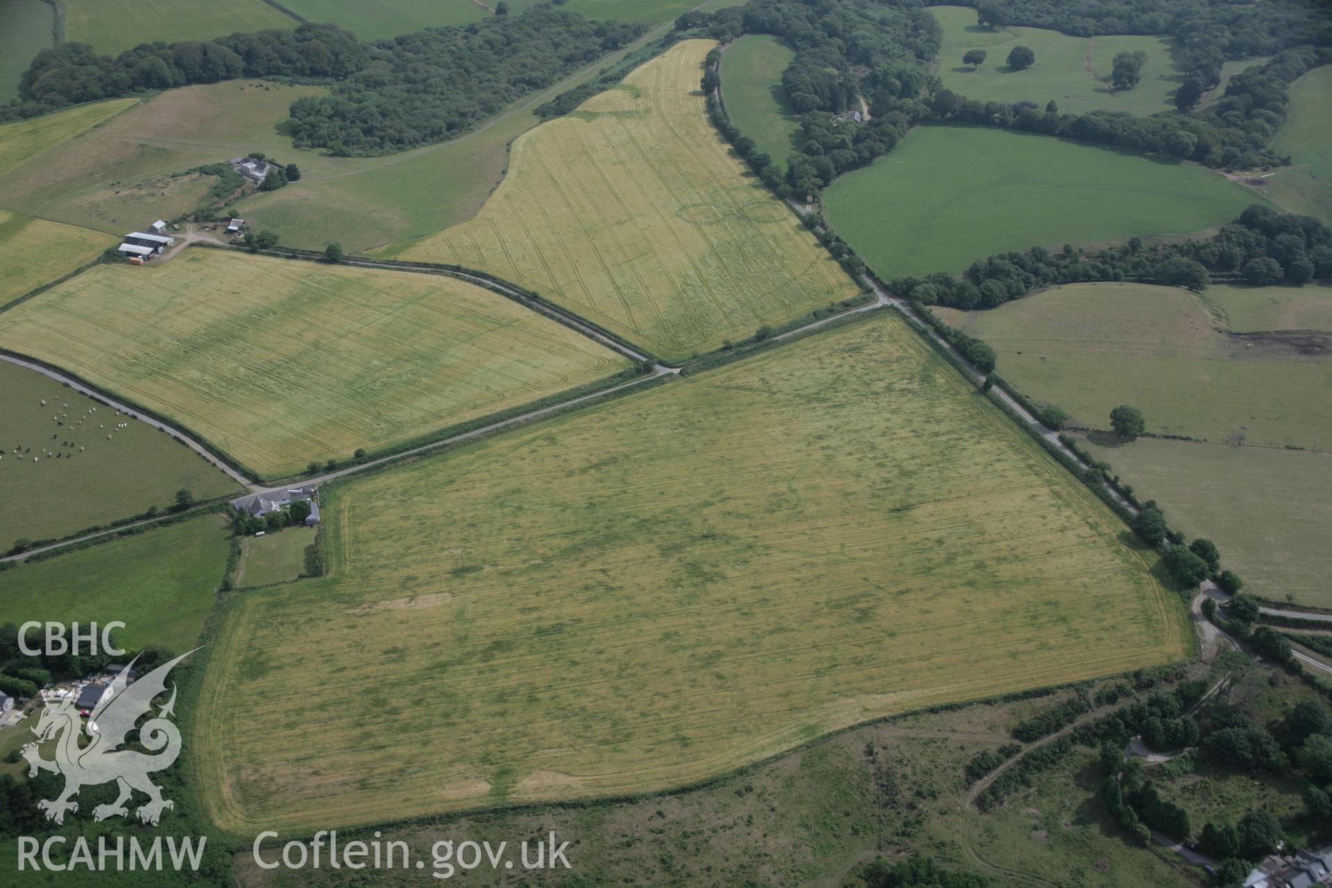 RCAHMW digital colour oblique photograph of cropmarks of relict field systems east of Pen Bryn Adda from the south-west. Taken on 27/07/2005 by T.G. Driver.