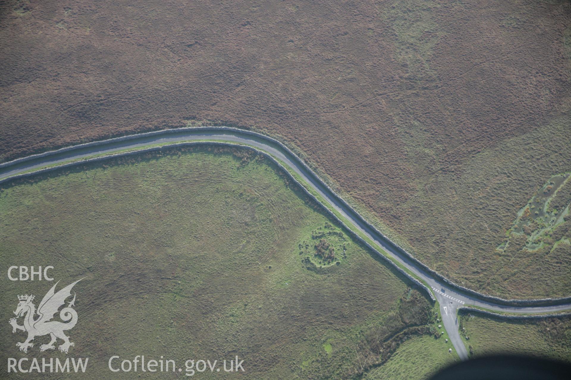 RCAHMW colour oblique aerial photograph of a cairn east of Hafotty Fach looking south-west. Taken on 17 October 2005 by Toby Driver