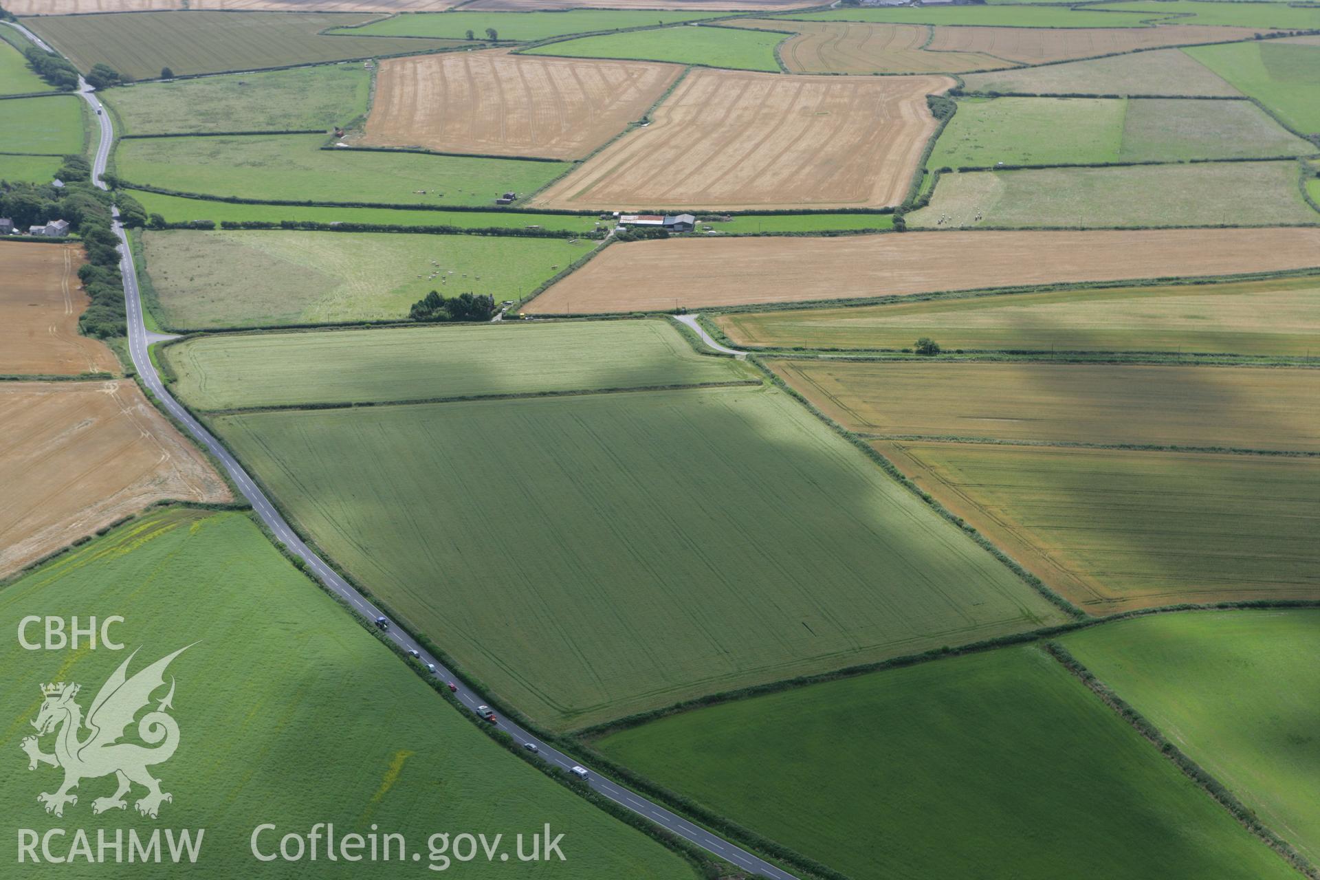 RCAHMW colour oblique photograph of Monkton East Round Barrows. Taken by Toby Driver on 21/07/2008.