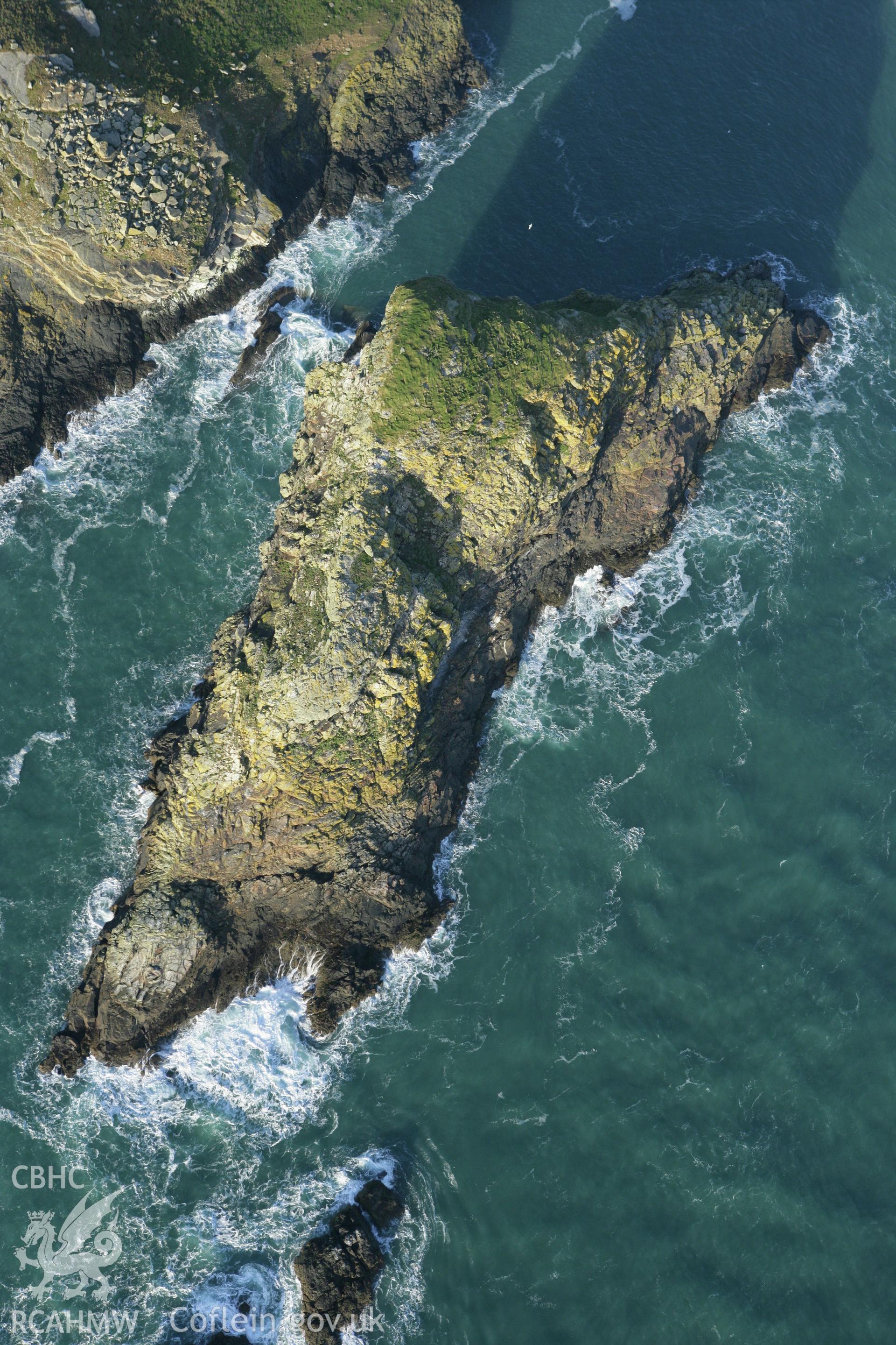 RCAHMW colour oblique photograph of Skomer Island, The Mew Stone, off-shore stack. Taken by Toby Driver on 04/03/2008.