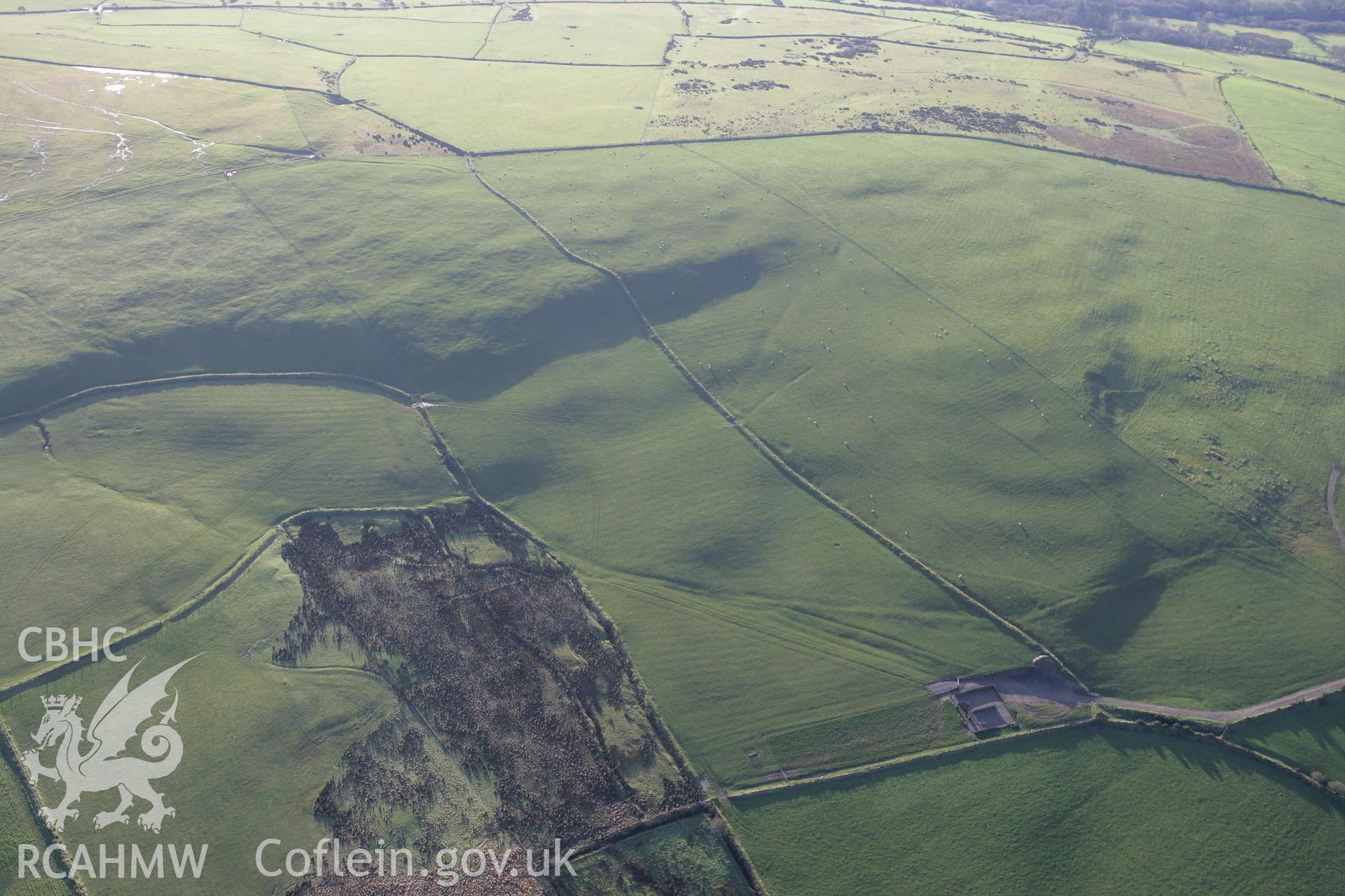 RCAHMW colour oblique photograph of fields to the south of Trefach Promontory Fort. Taken by Toby Driver on 15/12/2008.