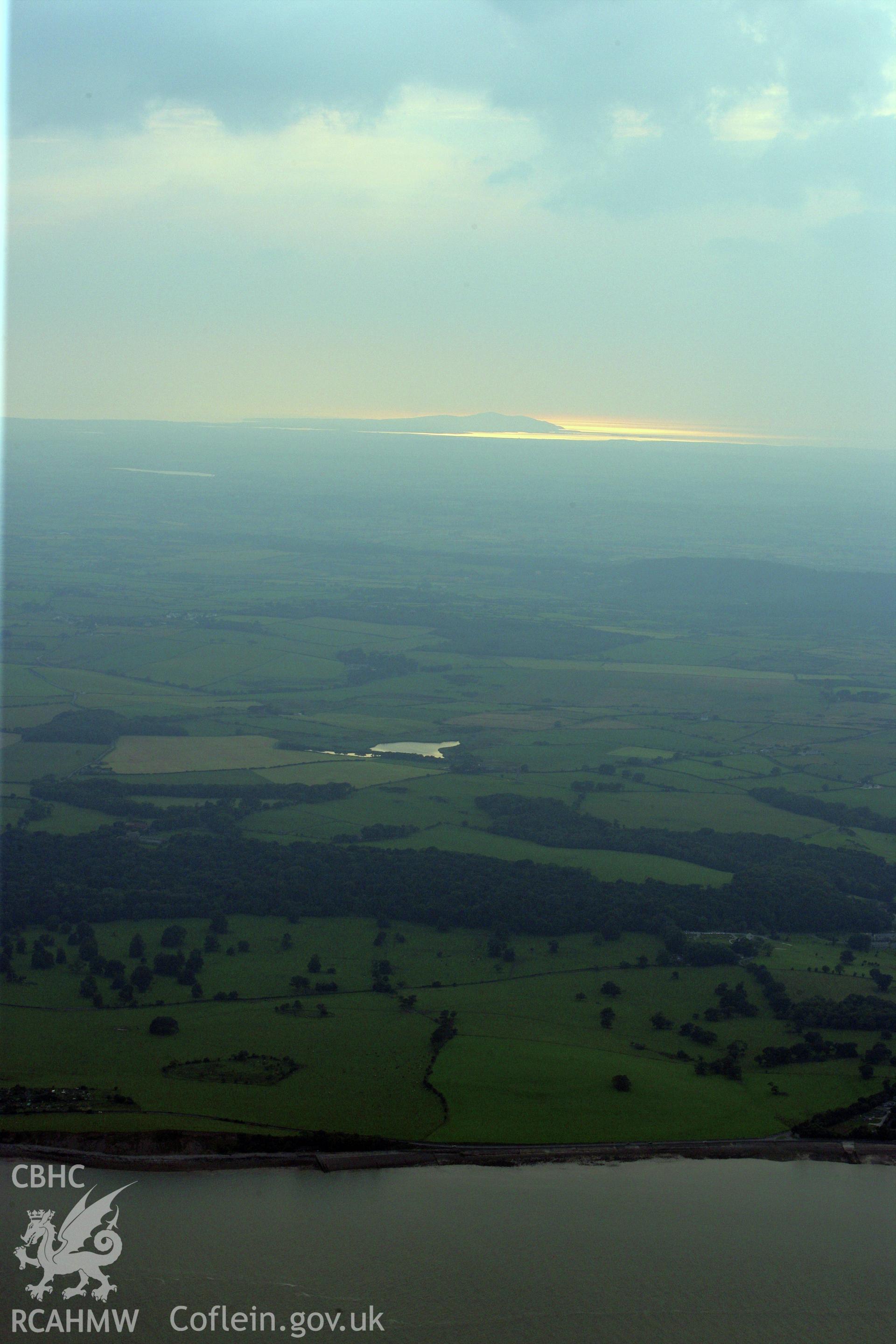 RCAHMW colour oblique photograph of view looking west towards Holyhead Mountain. Taken by Toby Driver on 24/07/2008.