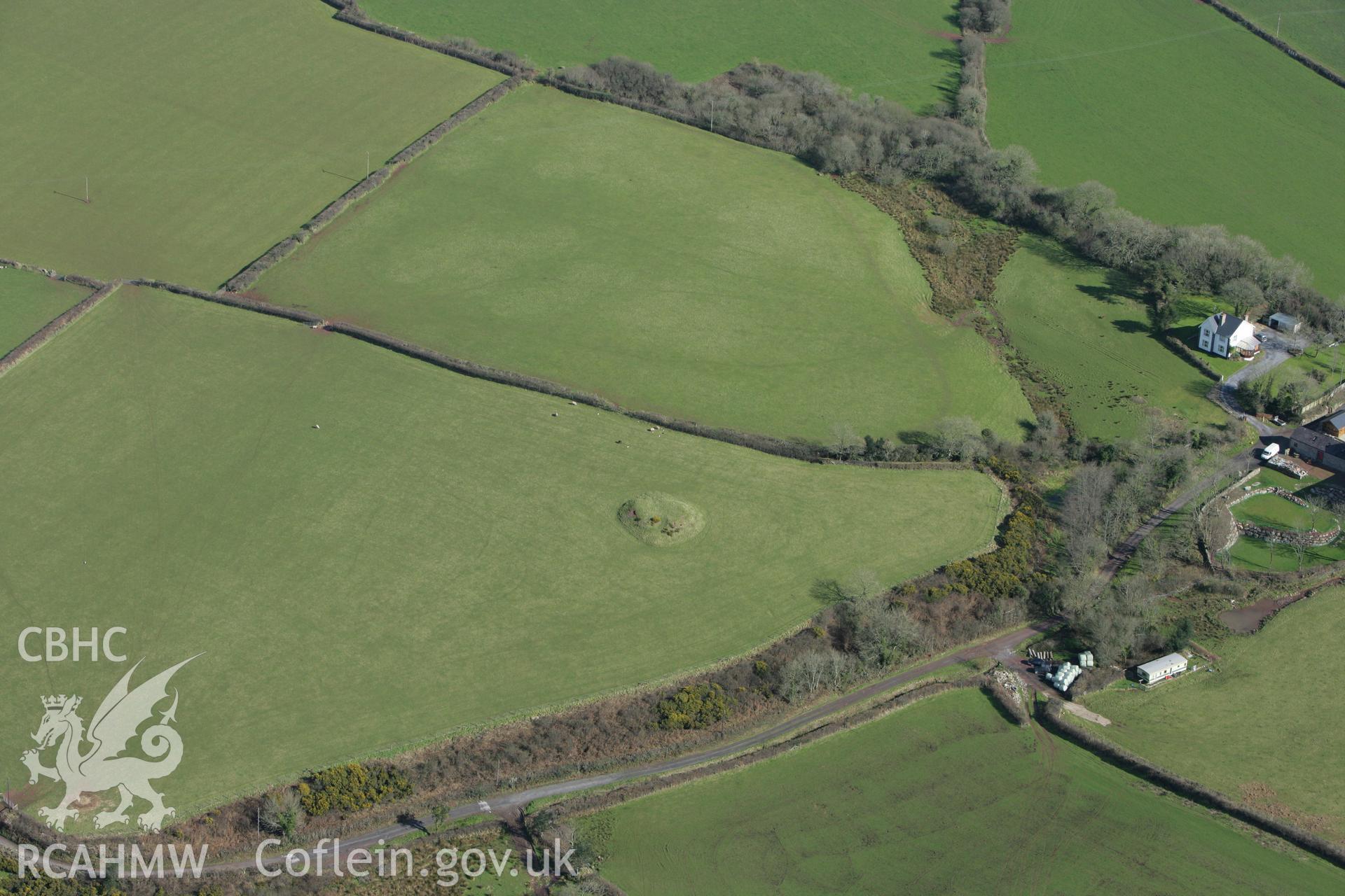 RCAHMW colour oblique photograph of Lower Castle Ely Tumulus (Parc-y-twmp). Taken by Toby Driver on 04/03/2008.